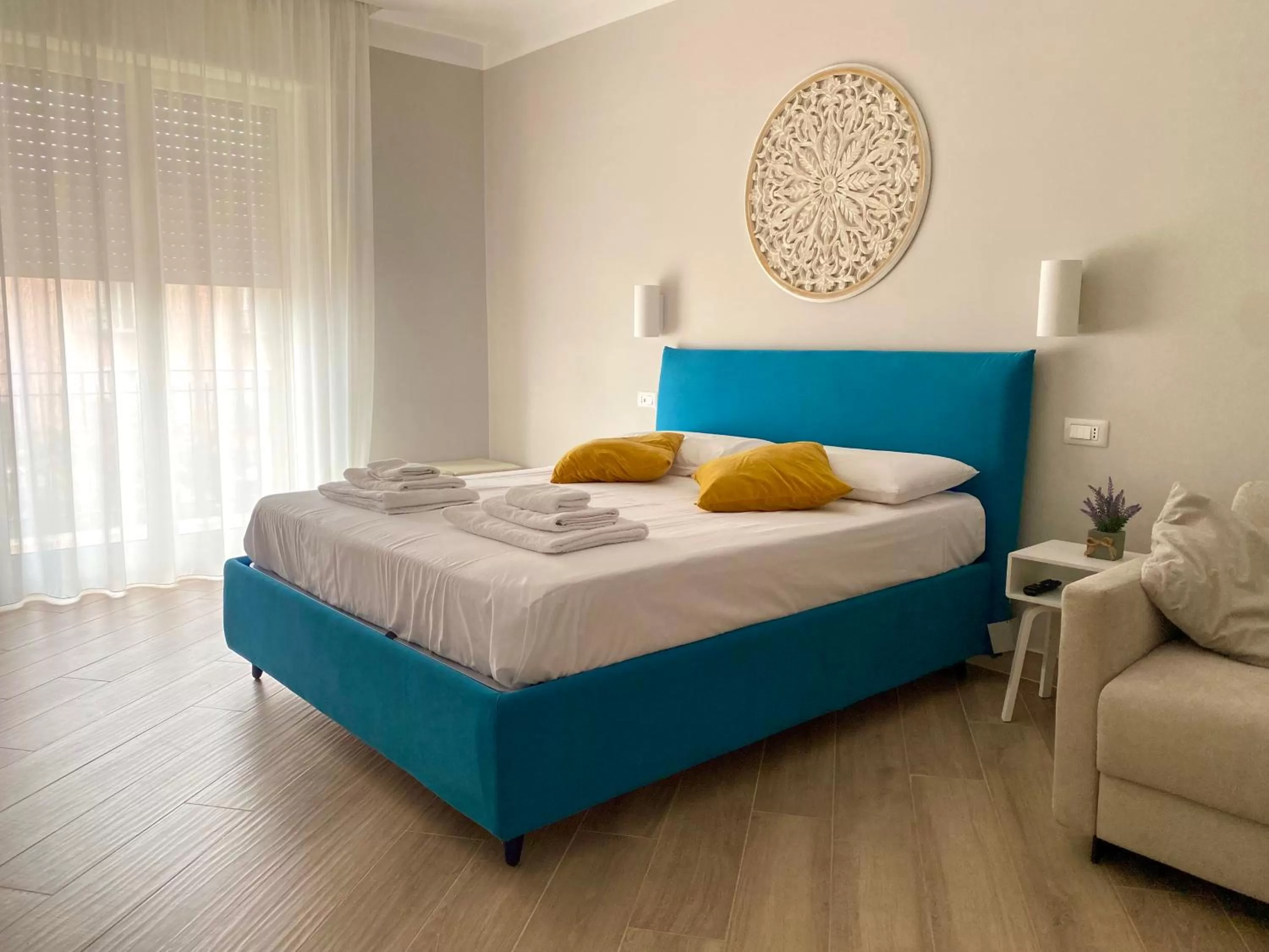 Photo of the whole room, Bed in Luna Nuova Suites