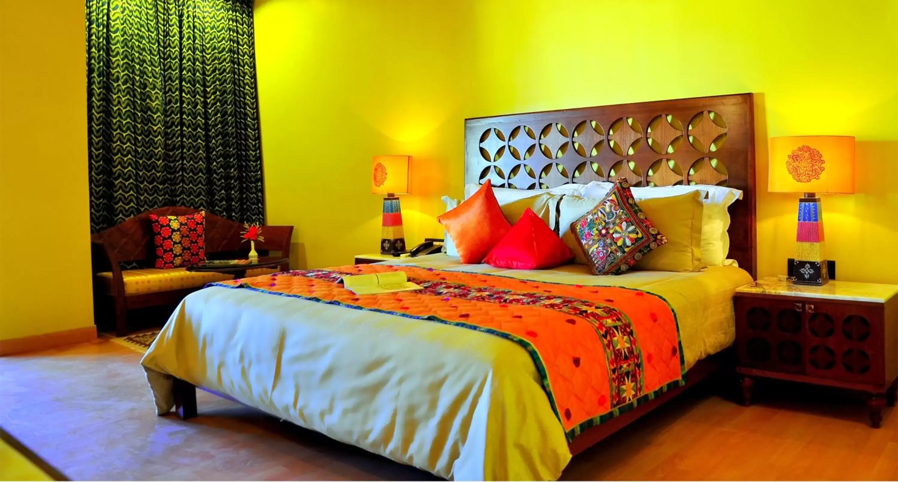 Bed in juSTa Rajputana Resort & Spa