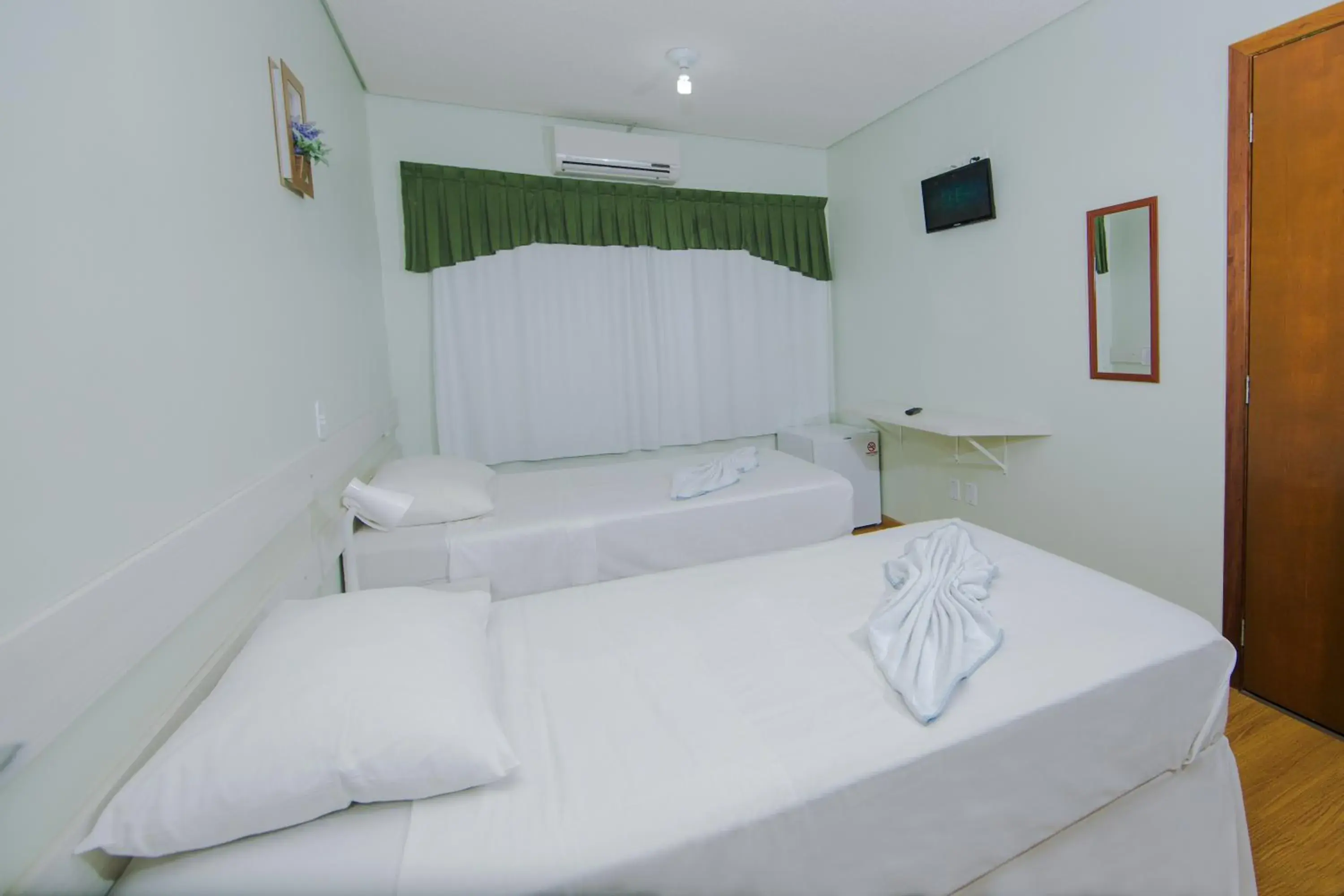 Bedroom, Bed in Pousada Charm Iguassu Suites