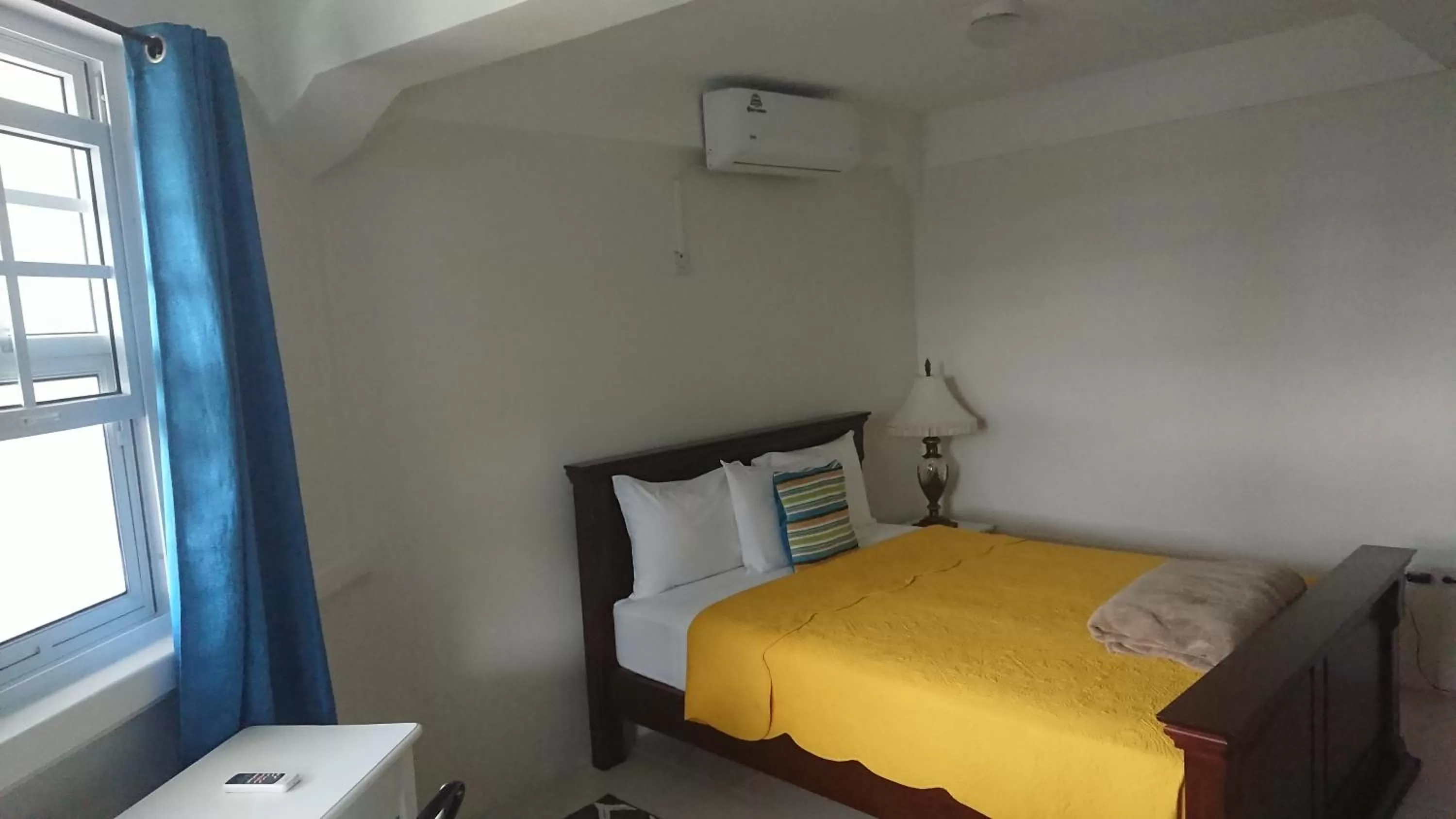 Bed in Classique International in Dominica