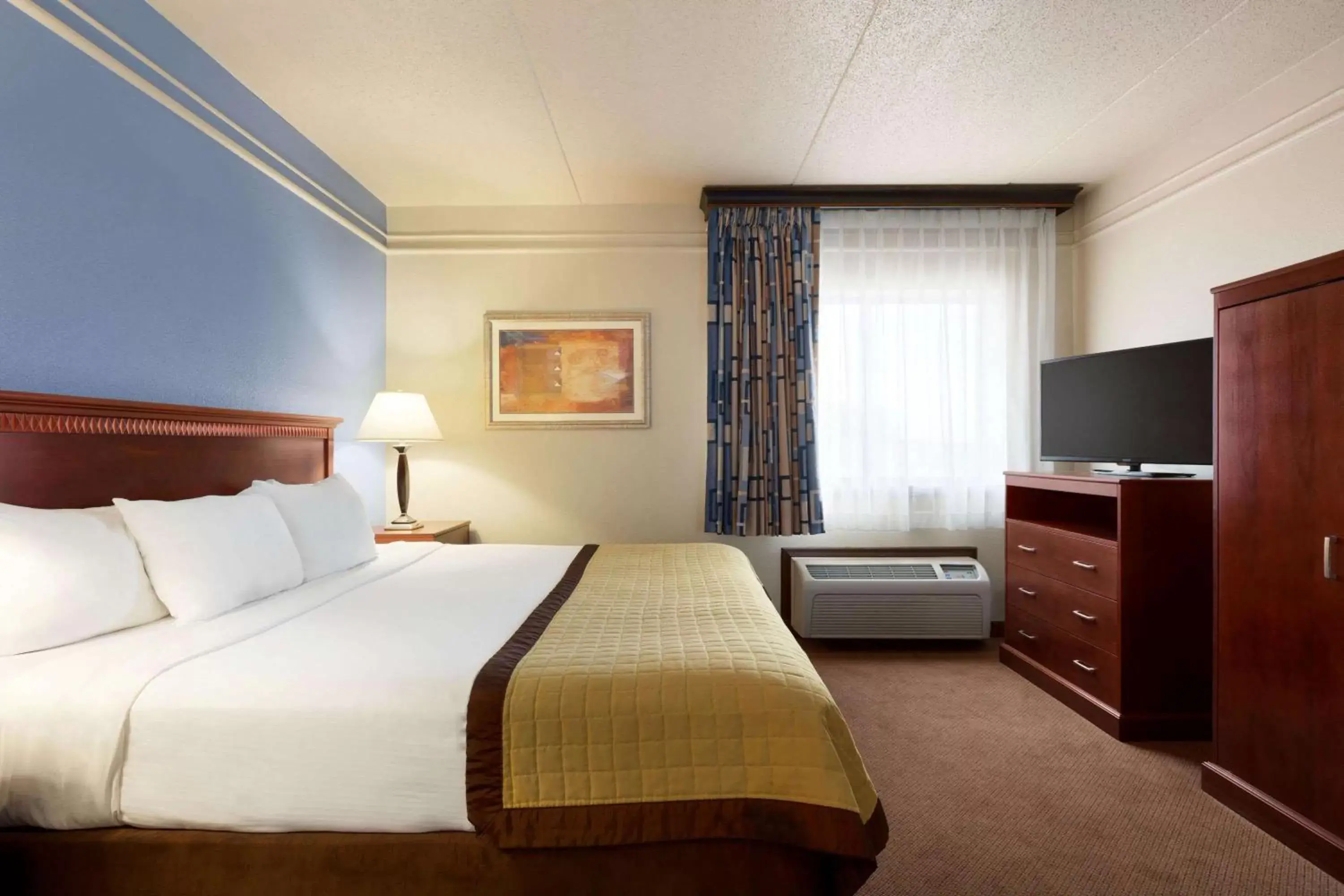 Photo of the whole room, Bed in Ramada by Wyndham Fargo