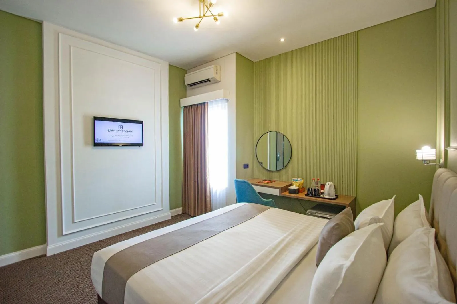 Bedroom, Bed in Hotel FortunaGrande Malioboro Yogyakarta