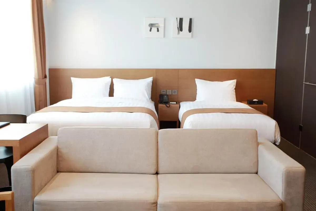 Bed in Gangneung City Hotel