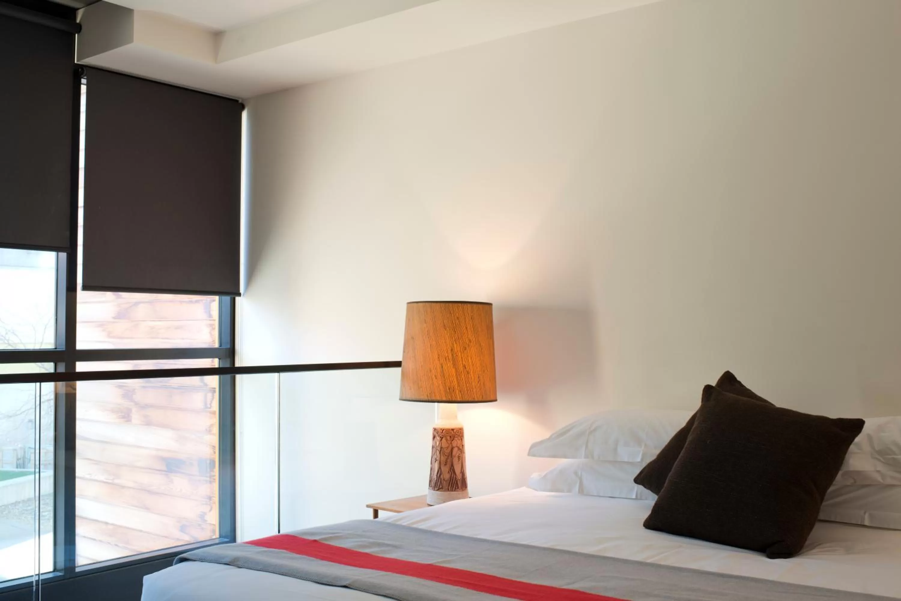 Bed in Nishi Apartments Eco Living by Ovolo