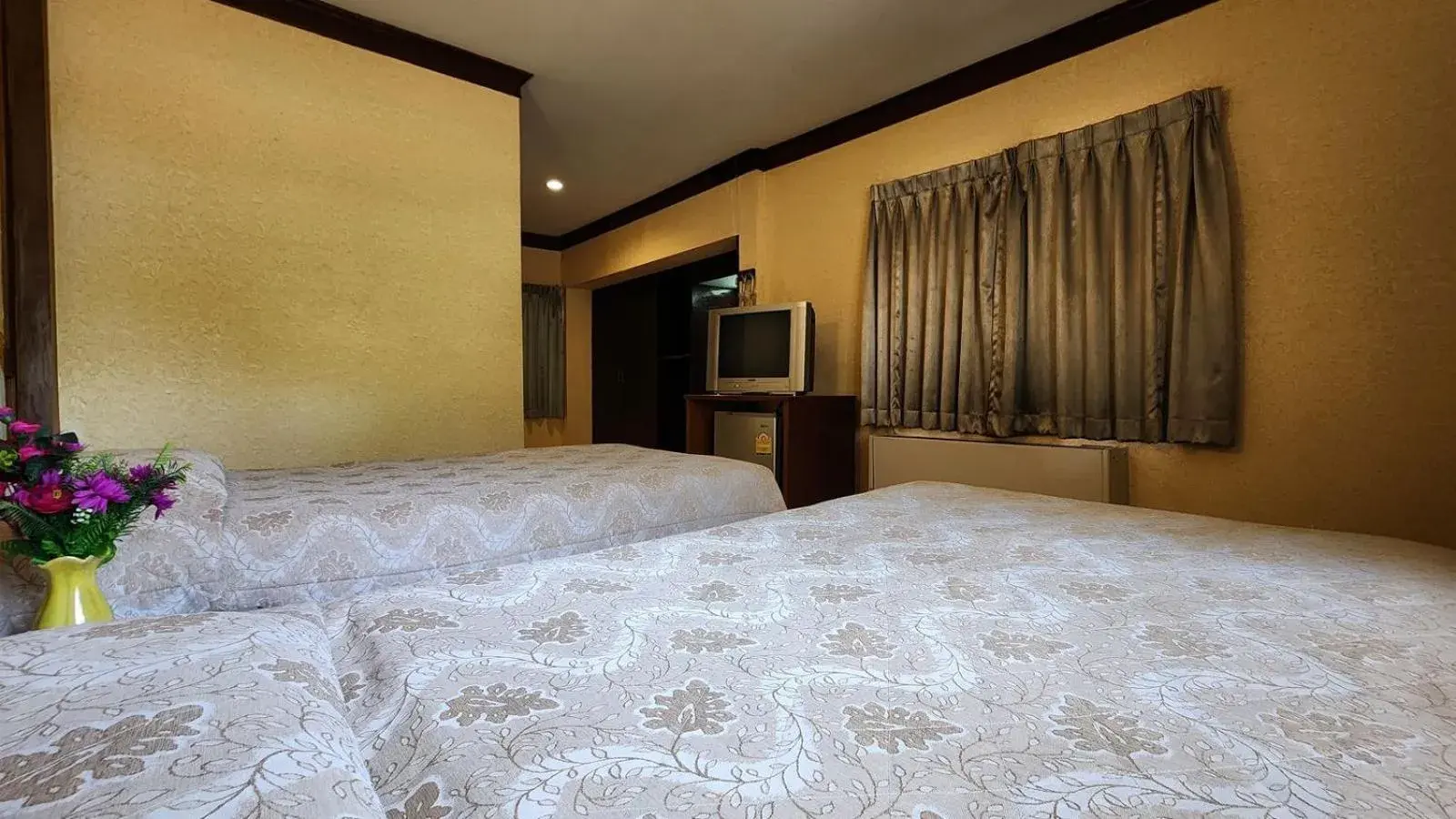 Bed in Pattaya Garden Resort Bed in Pattaya Garden Resort