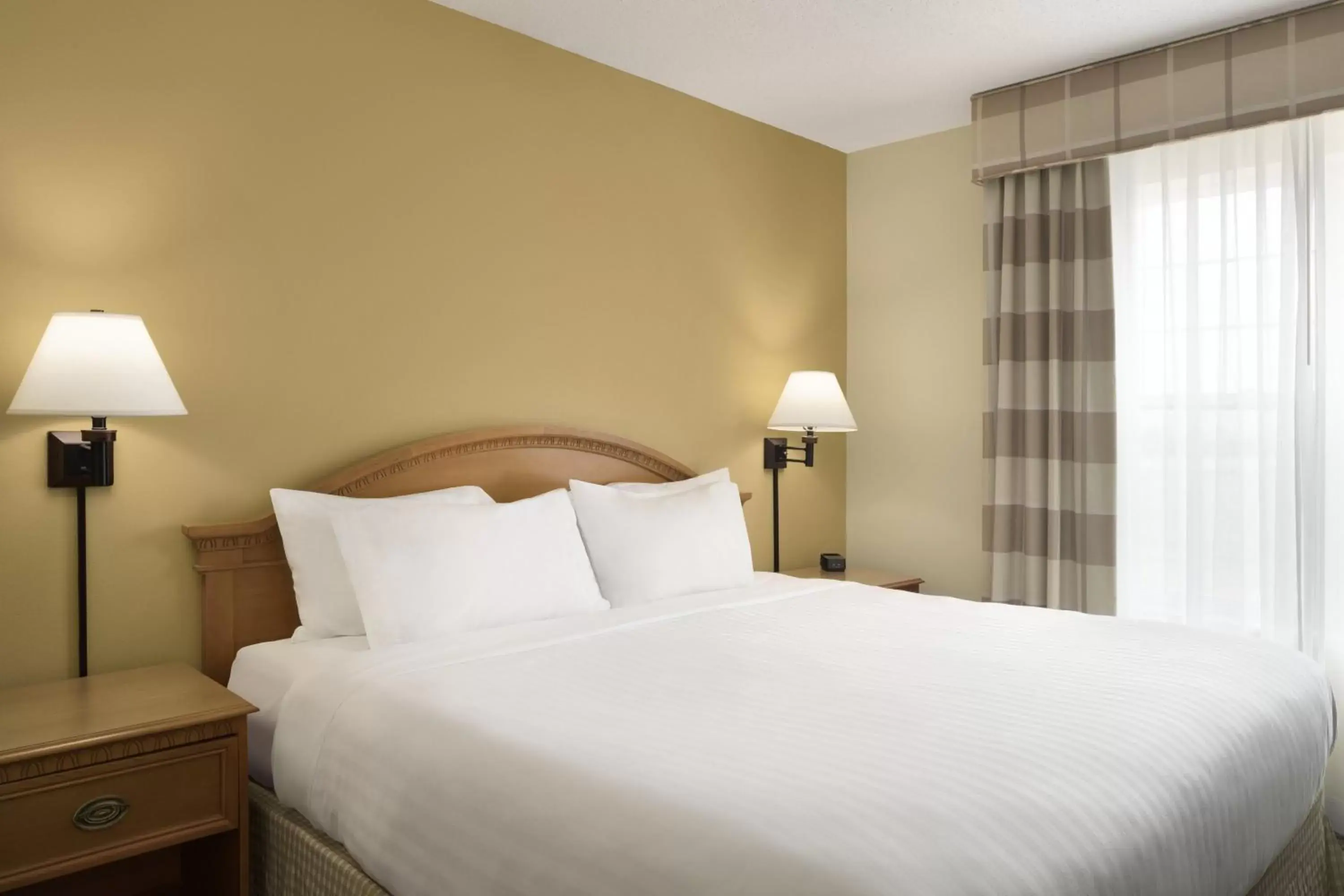 Bed in Country Inn & Suites by Radisson, Grinnell, IA