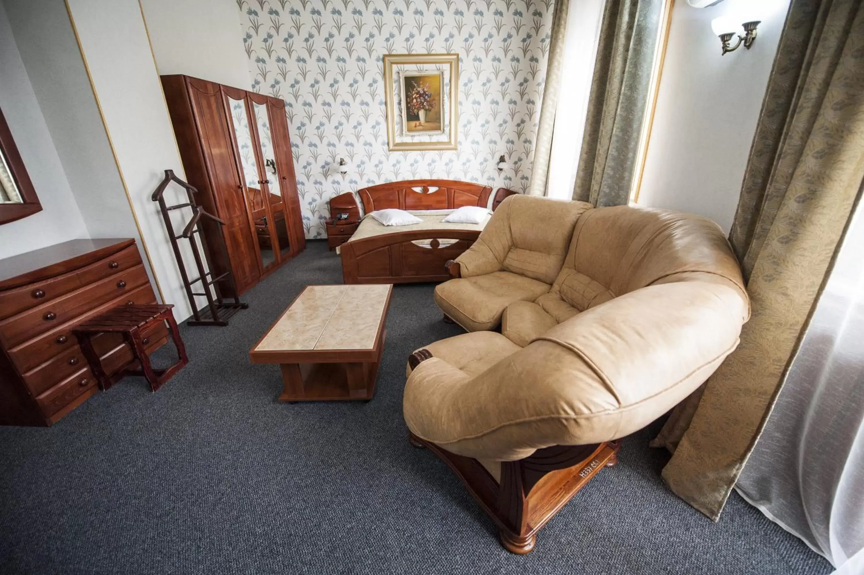 Photo of the whole room, Seating Area in Bucharest Comfort Suites Hotel