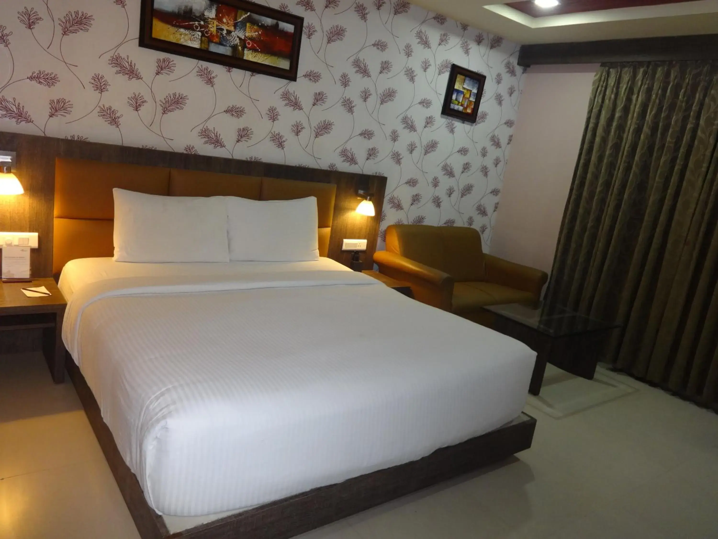 Bed in Pride Ananya Resort Puri