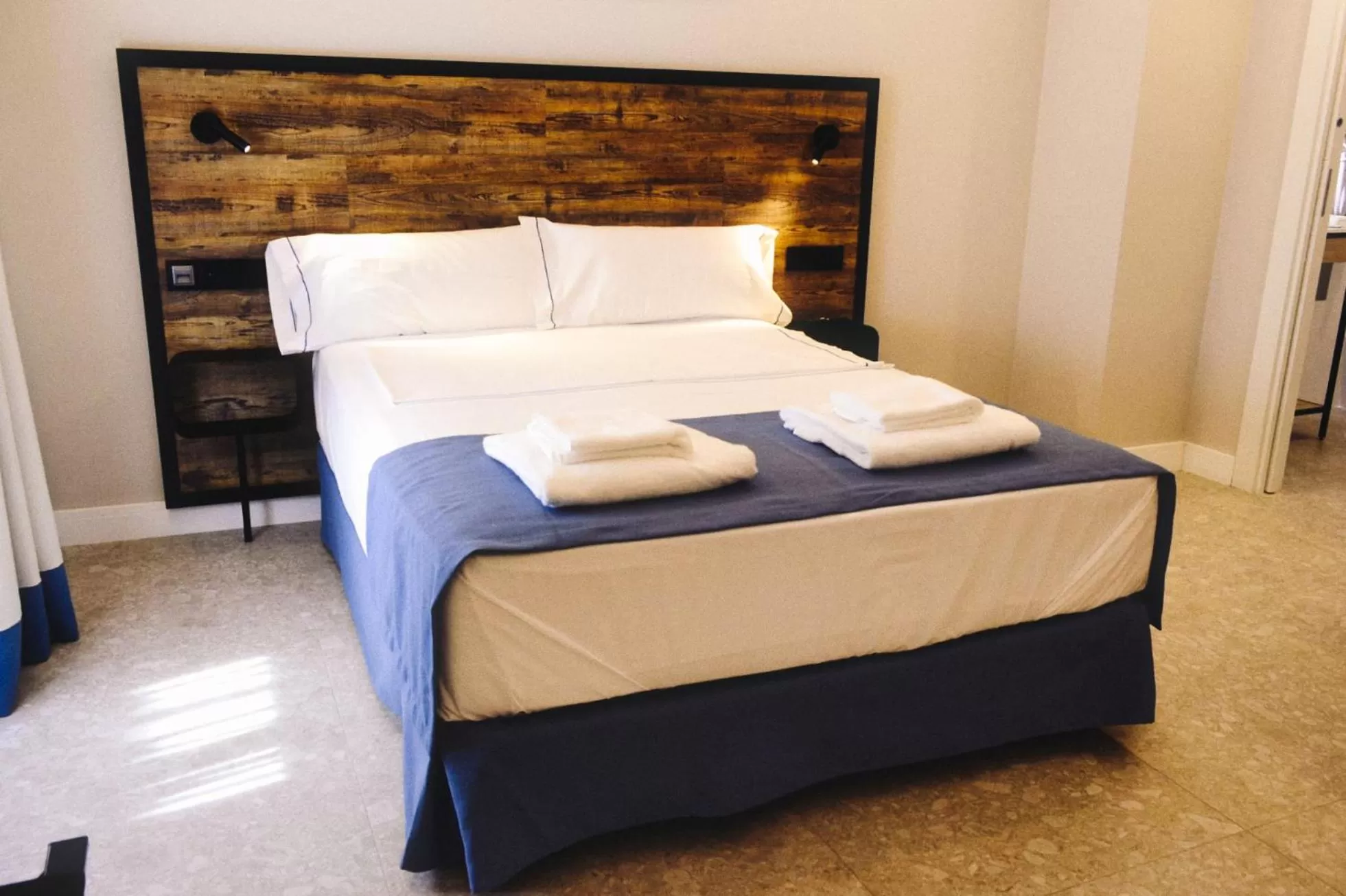 Bed in Posidonia Aparthotel