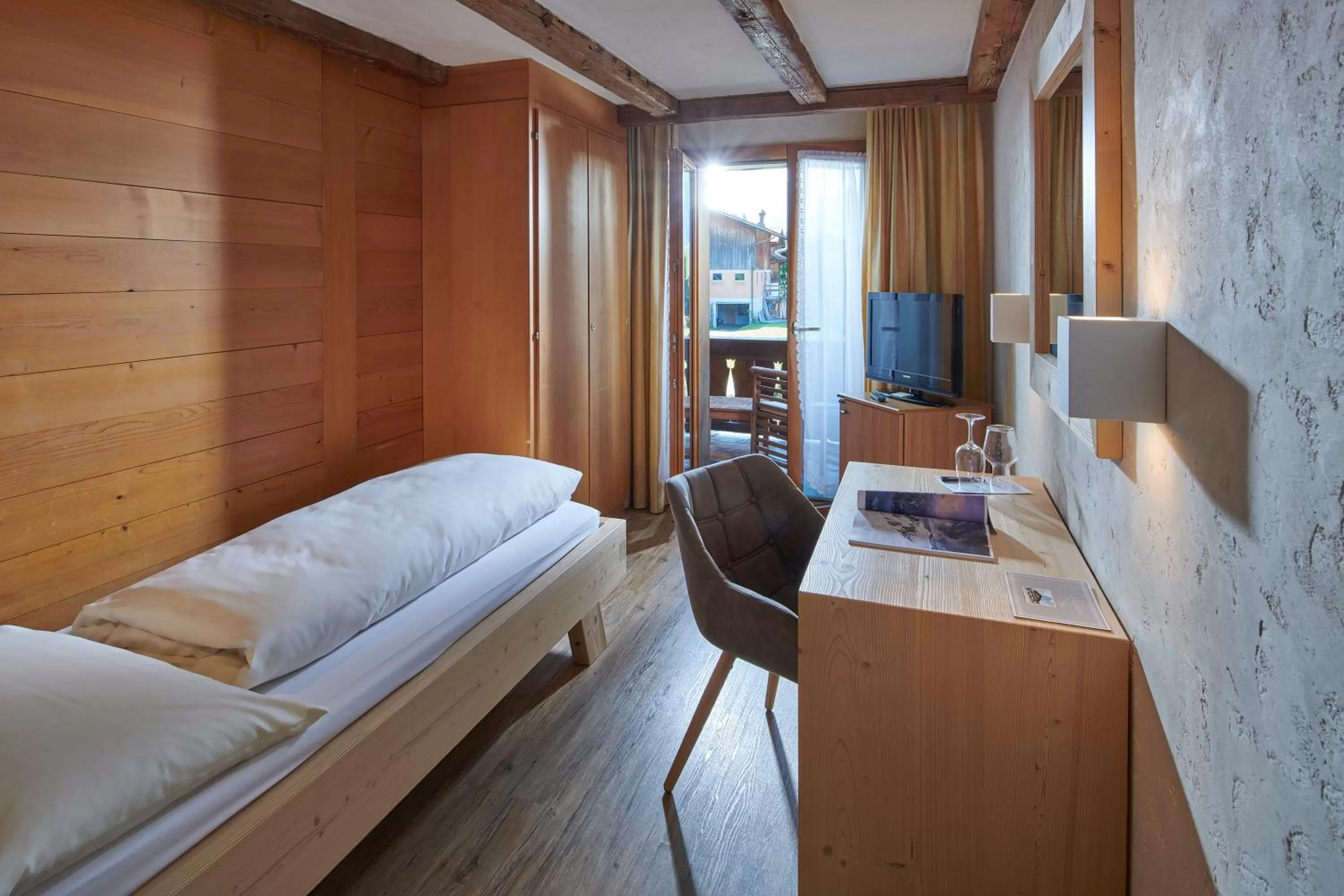 Bed in Hotel Alphorn