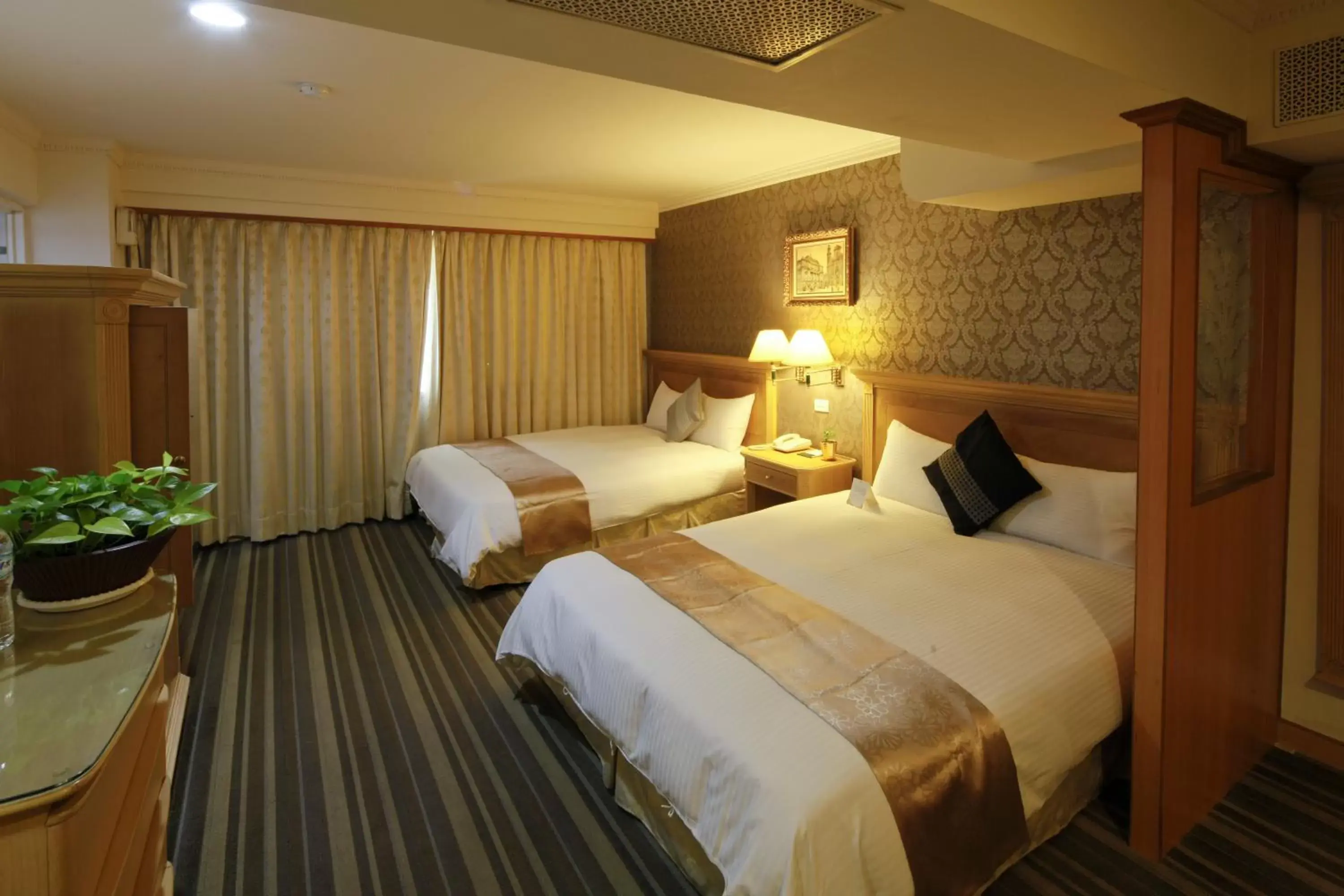 Photo of the whole room, Bed in Cambridge Tainan Hotel