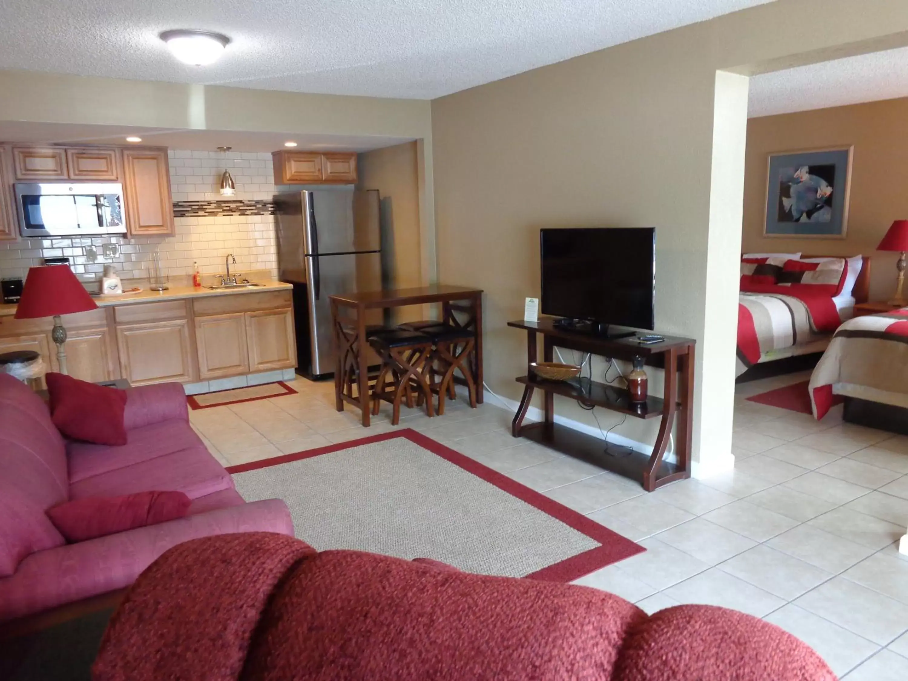 Living room, Seating Area in Days Inn by Wyndham Cocoa Cruiseport West At I-95/524