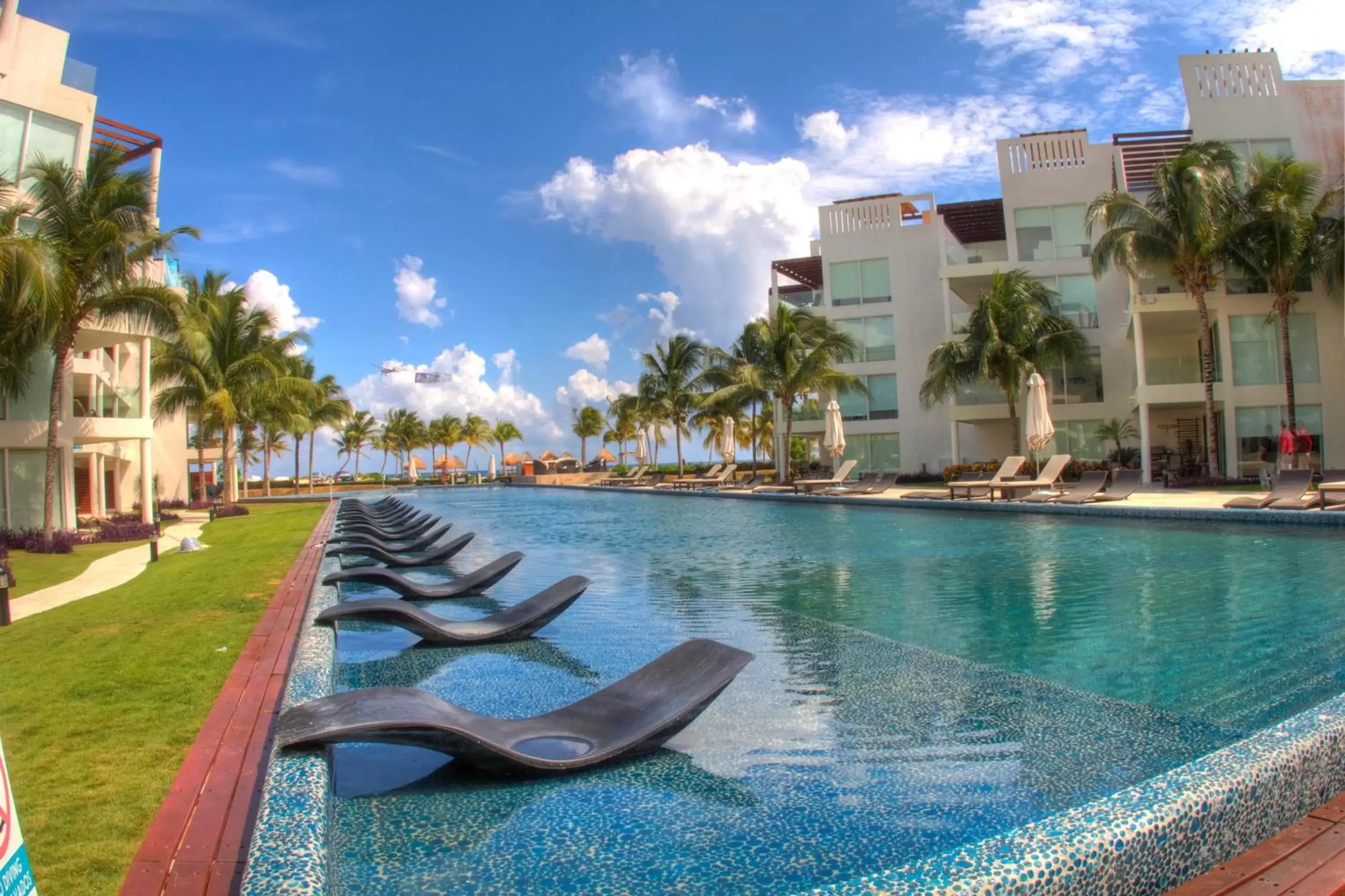 Swimming Pool in The Elements Oceanfront & Beachside Condo Hotel