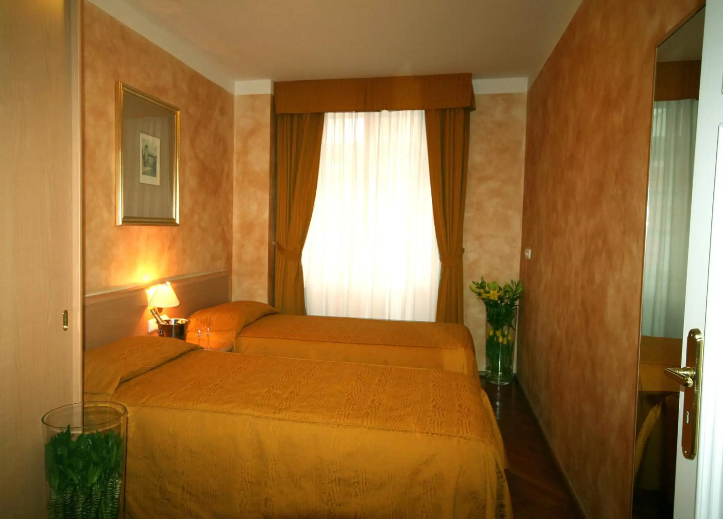 Bed in Hotel Roma Prague