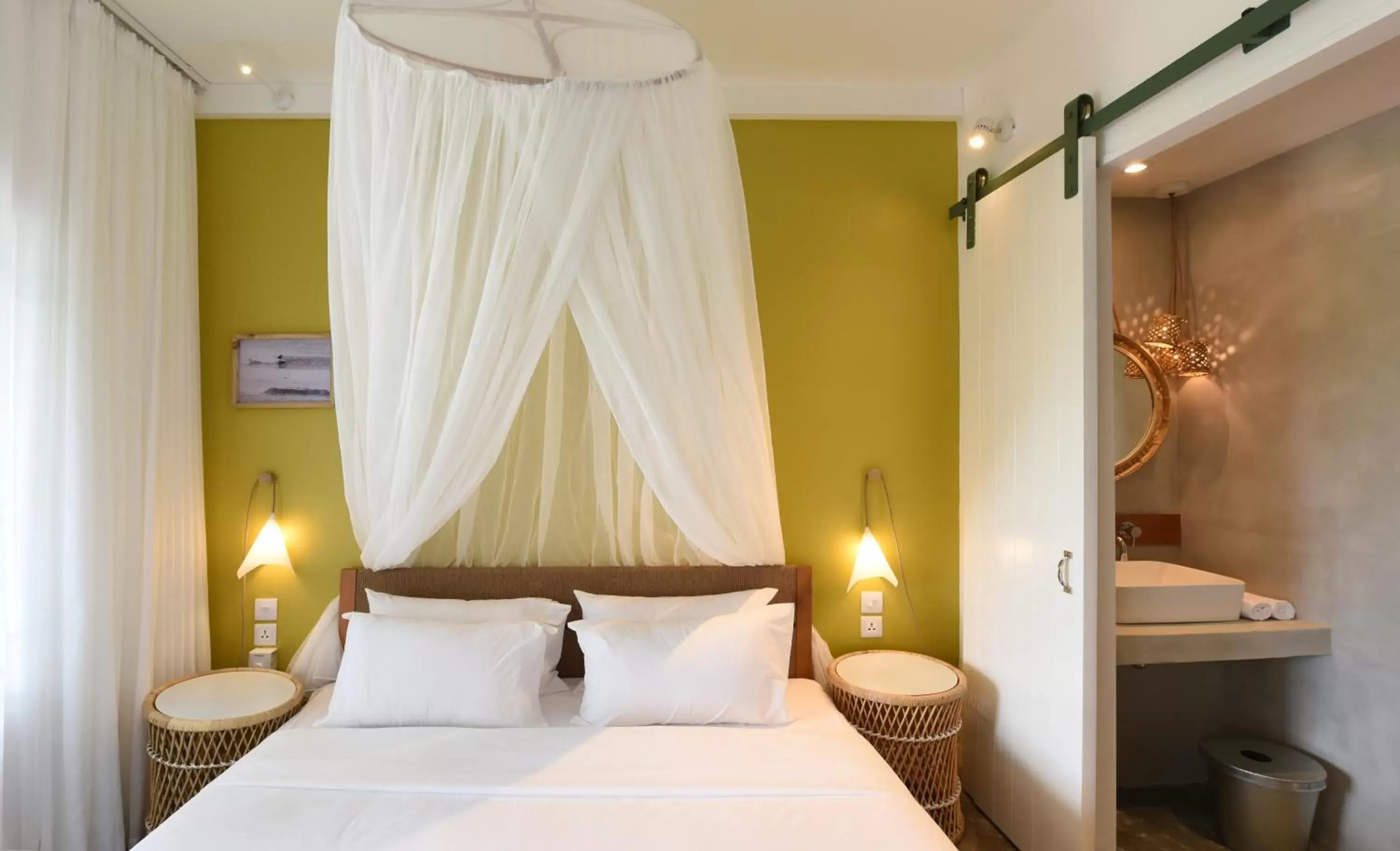 Bed in Veranda Tamarin Hotel & Spa