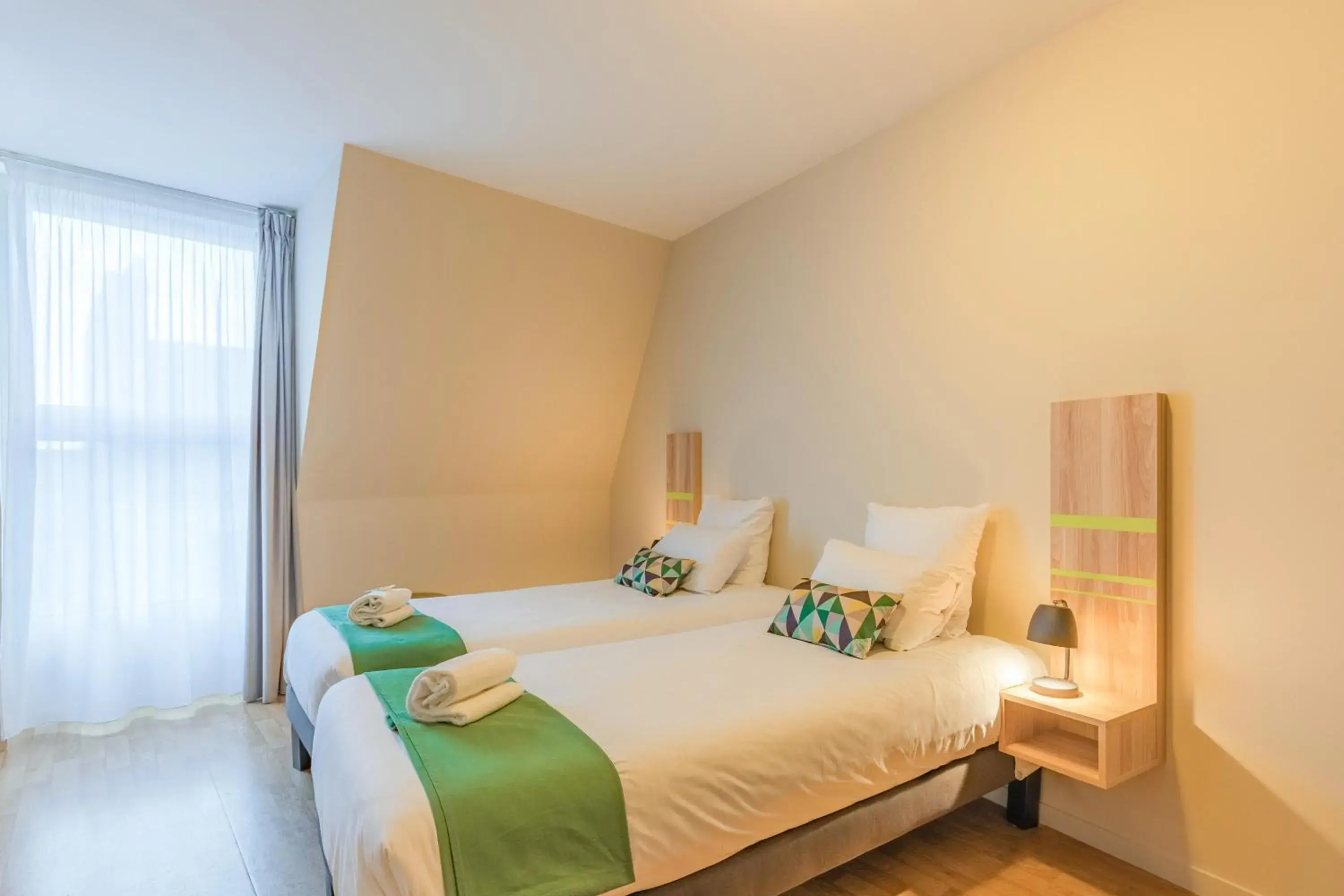 Bed in Park & Suites Elegance Nantes-Carre Bouffay