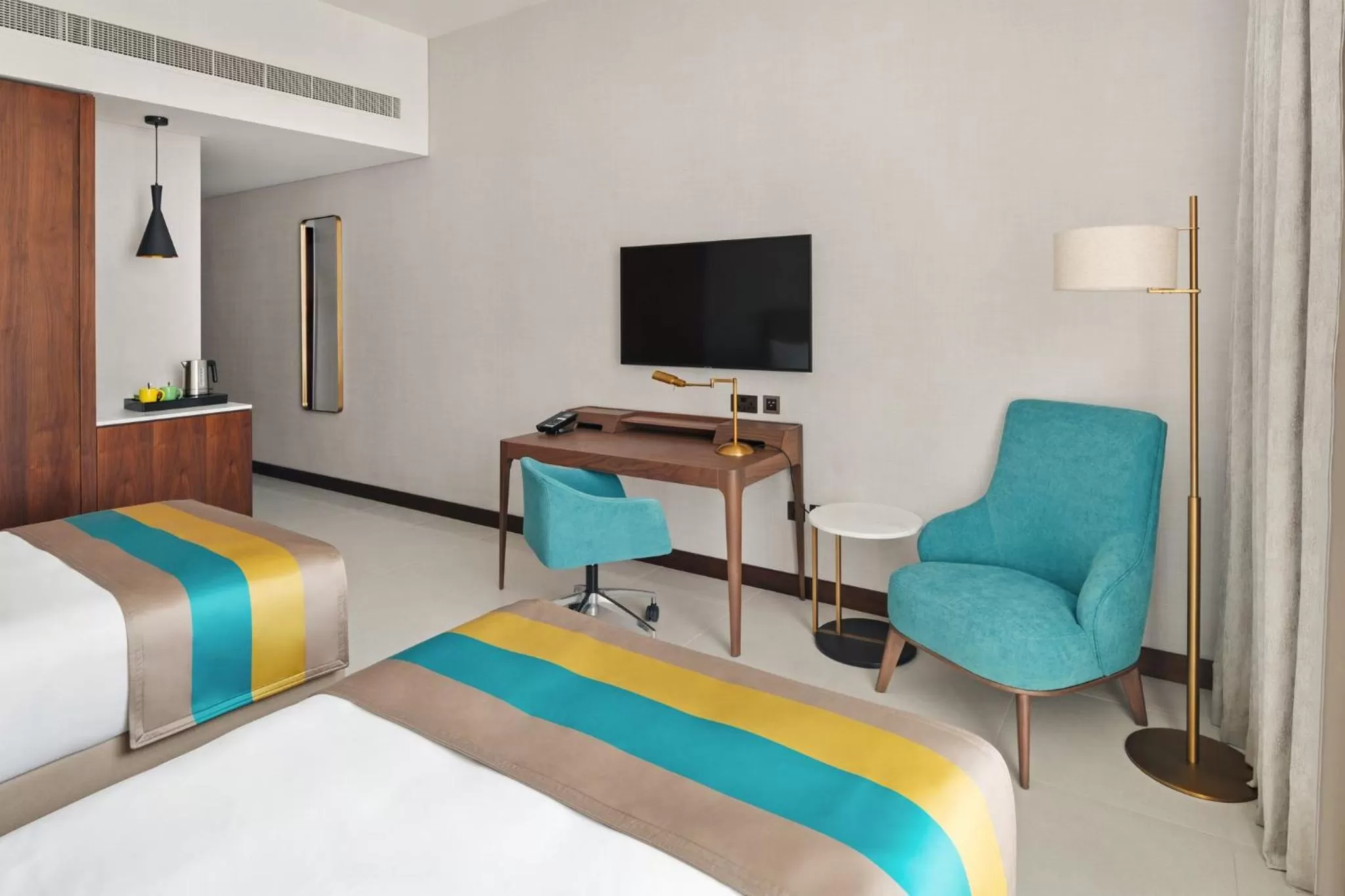 Photo of the whole room, Bed in Holiday Inn Dubai Al-Maktoum Airport by IHG