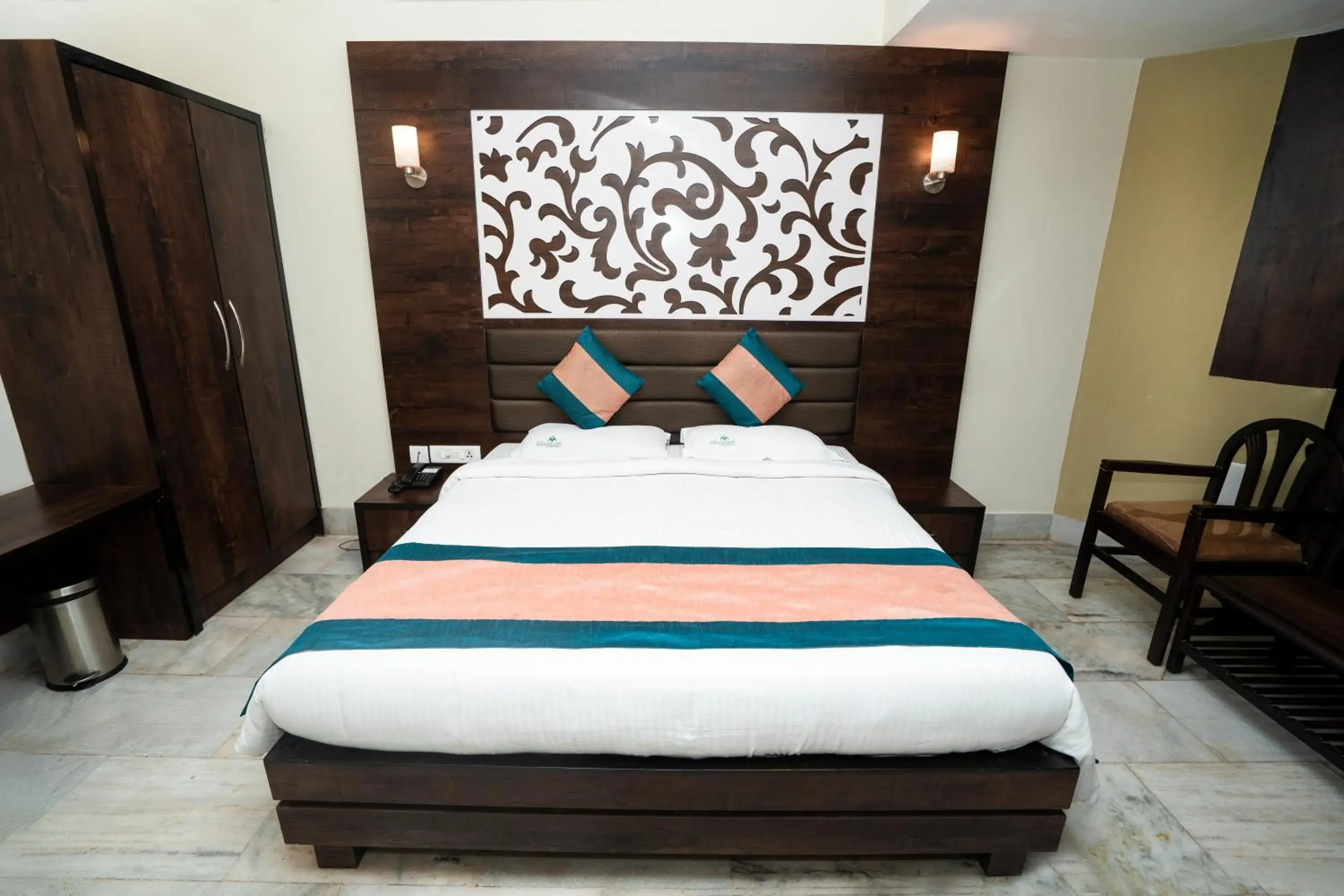 Bed in Hotel Mangalore International