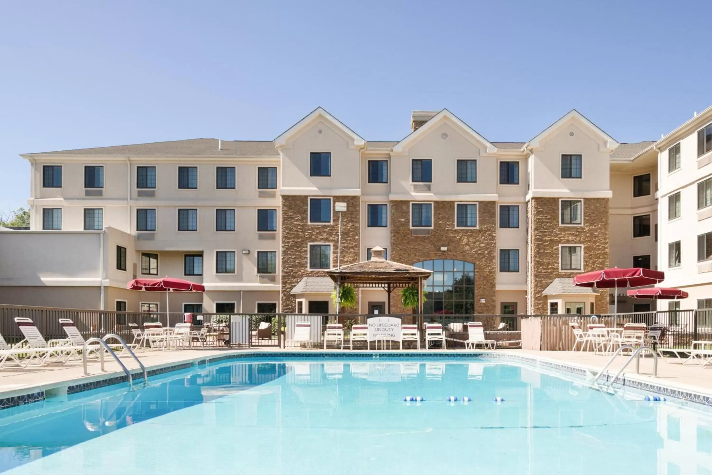 Swimming pool, Property Building in Staybridge Suites Wilmington-Newark, an IHG Hotel