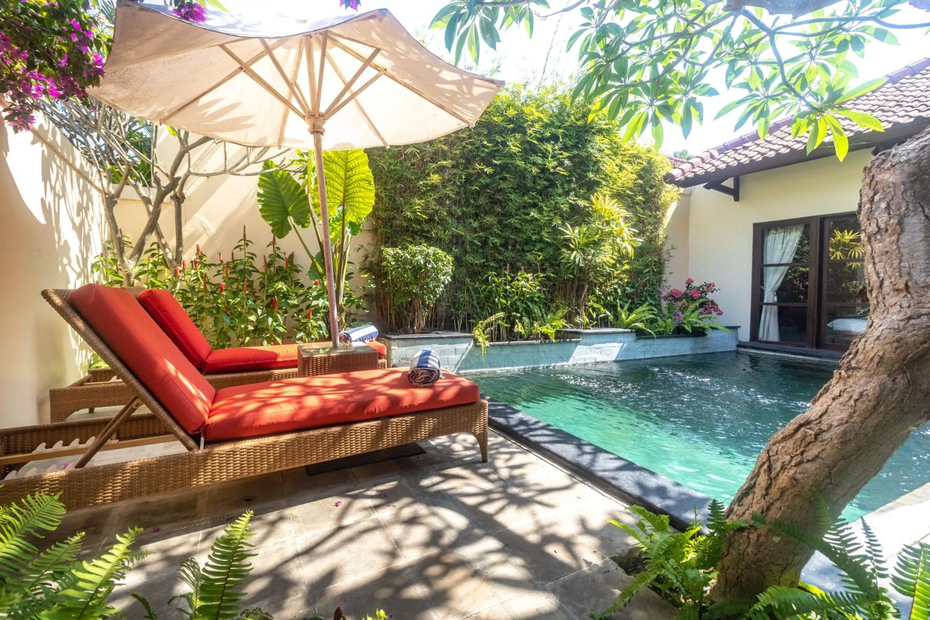 Swimming pool in Aleesha Villas and Suites