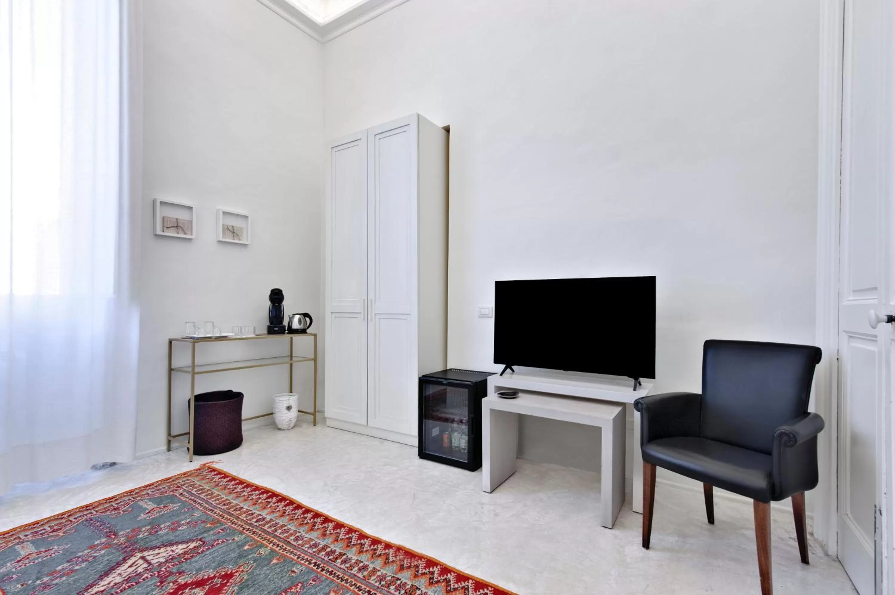 TV and multimedia in Casa di Lo Suites
