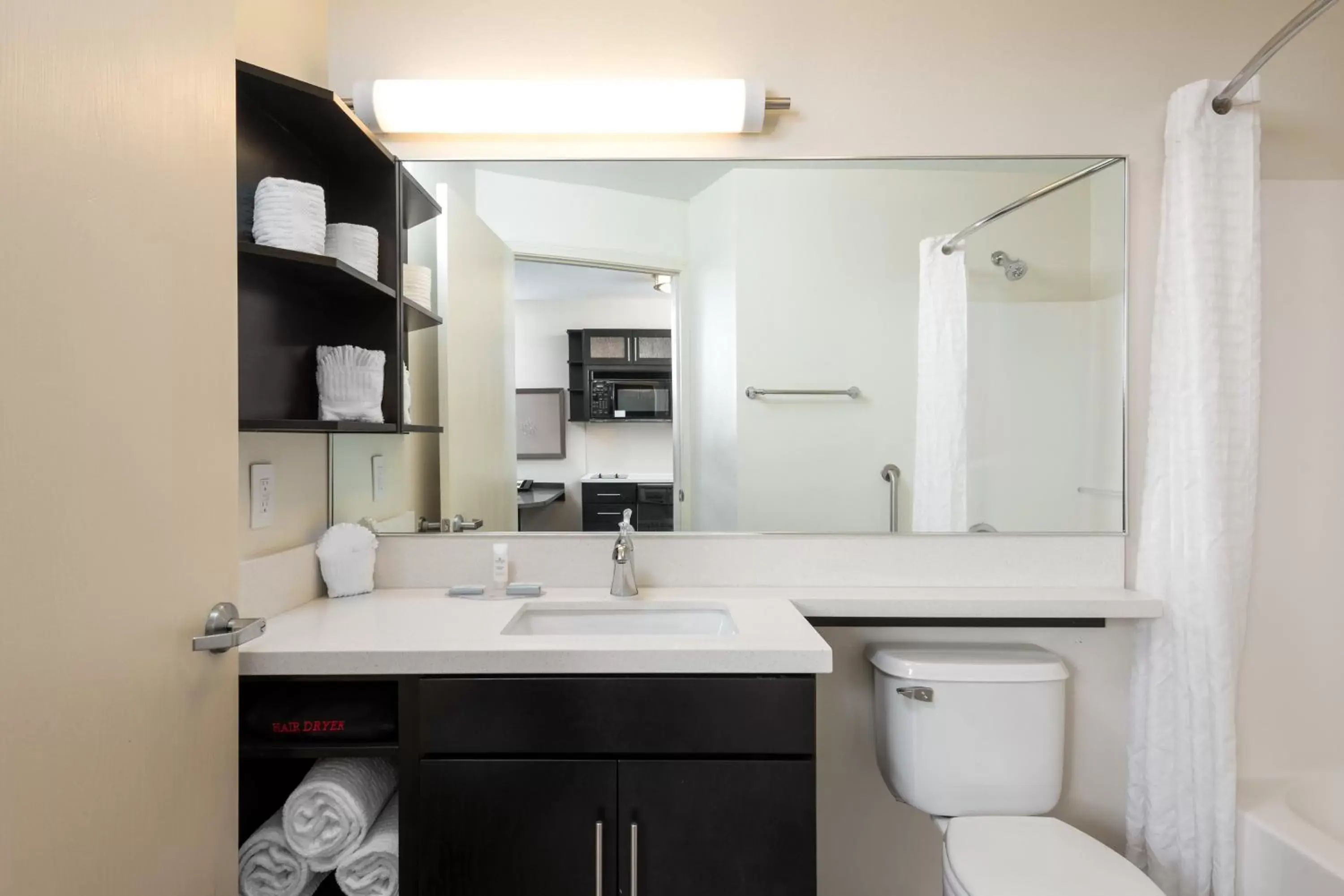 Photo of the whole room, Bathroom in Candlewood Suites Sterling, an IHG Hotel