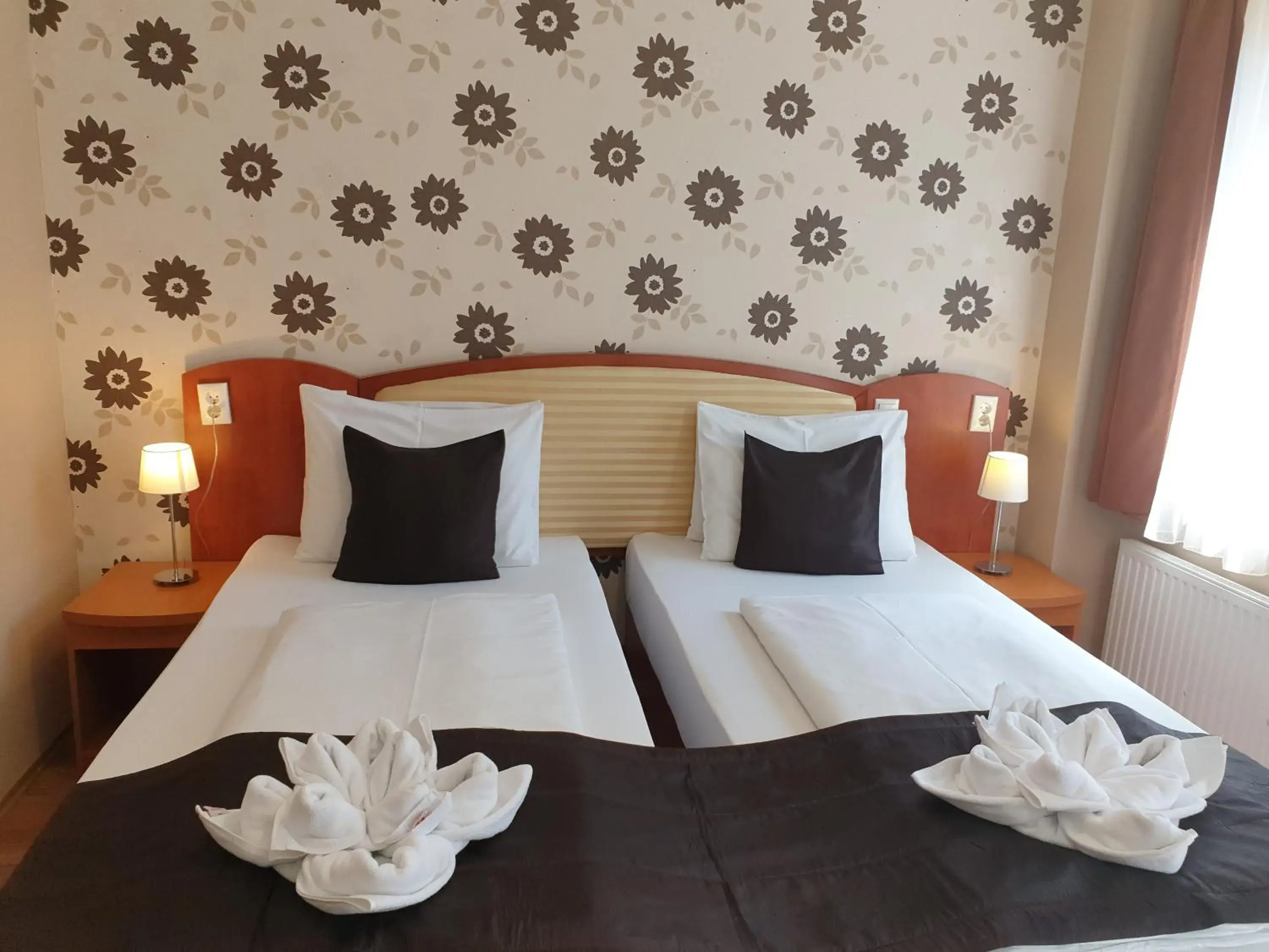 Bed in Six Inn Hotel