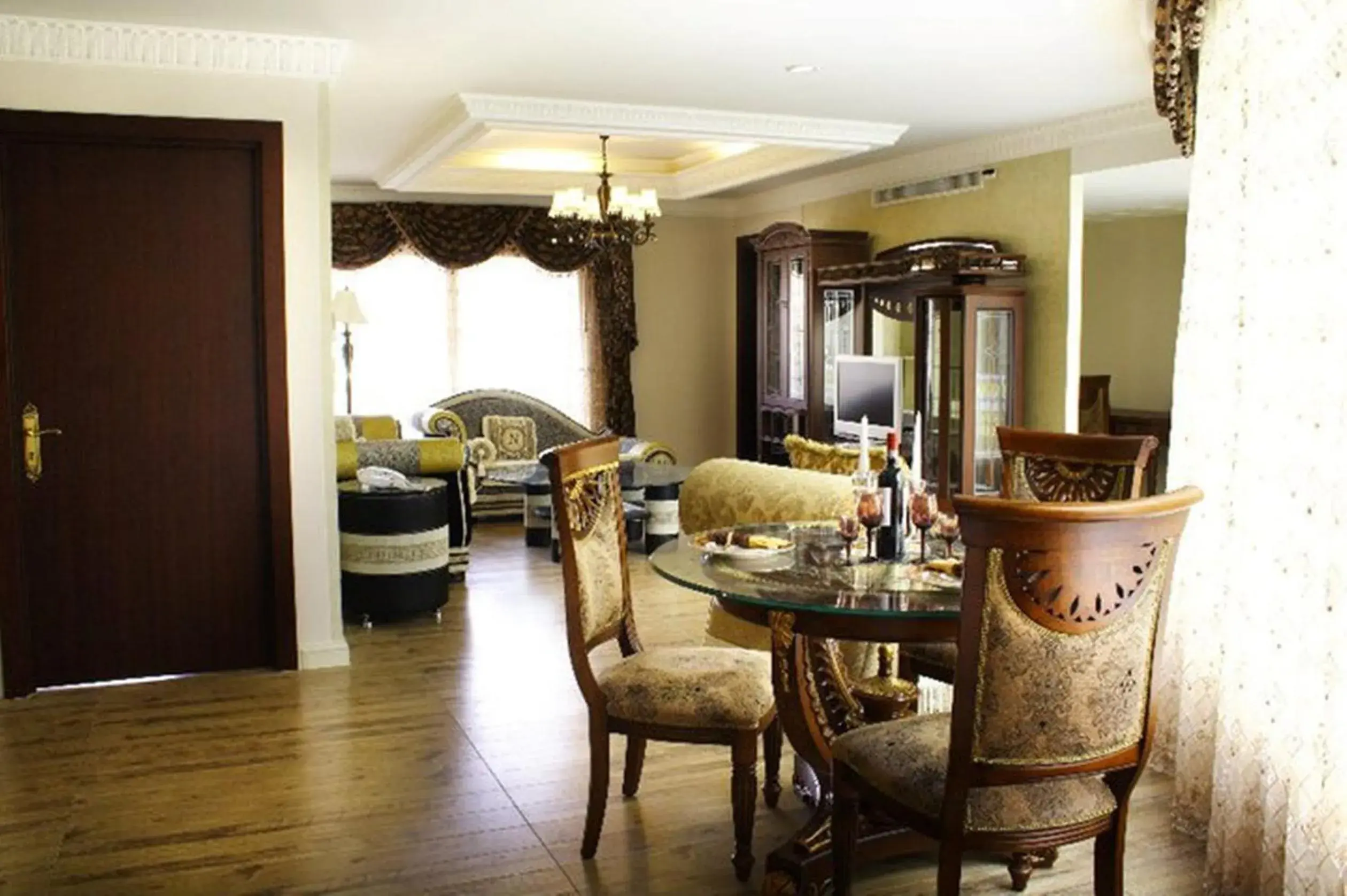 Living room, Dining Area in Four Seasons Place Hotel