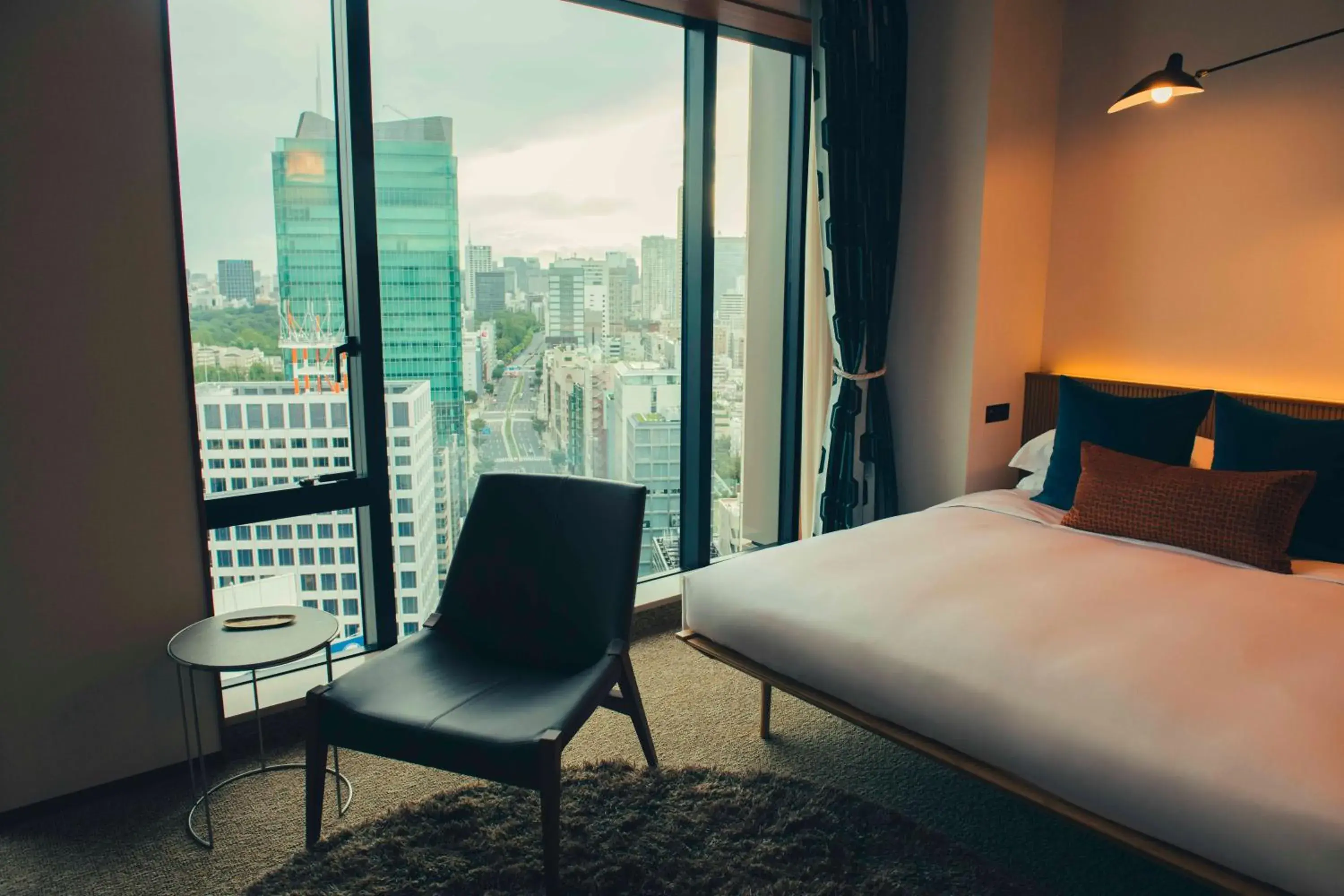 Bed in THE AOYAMA GRAND HOTEL