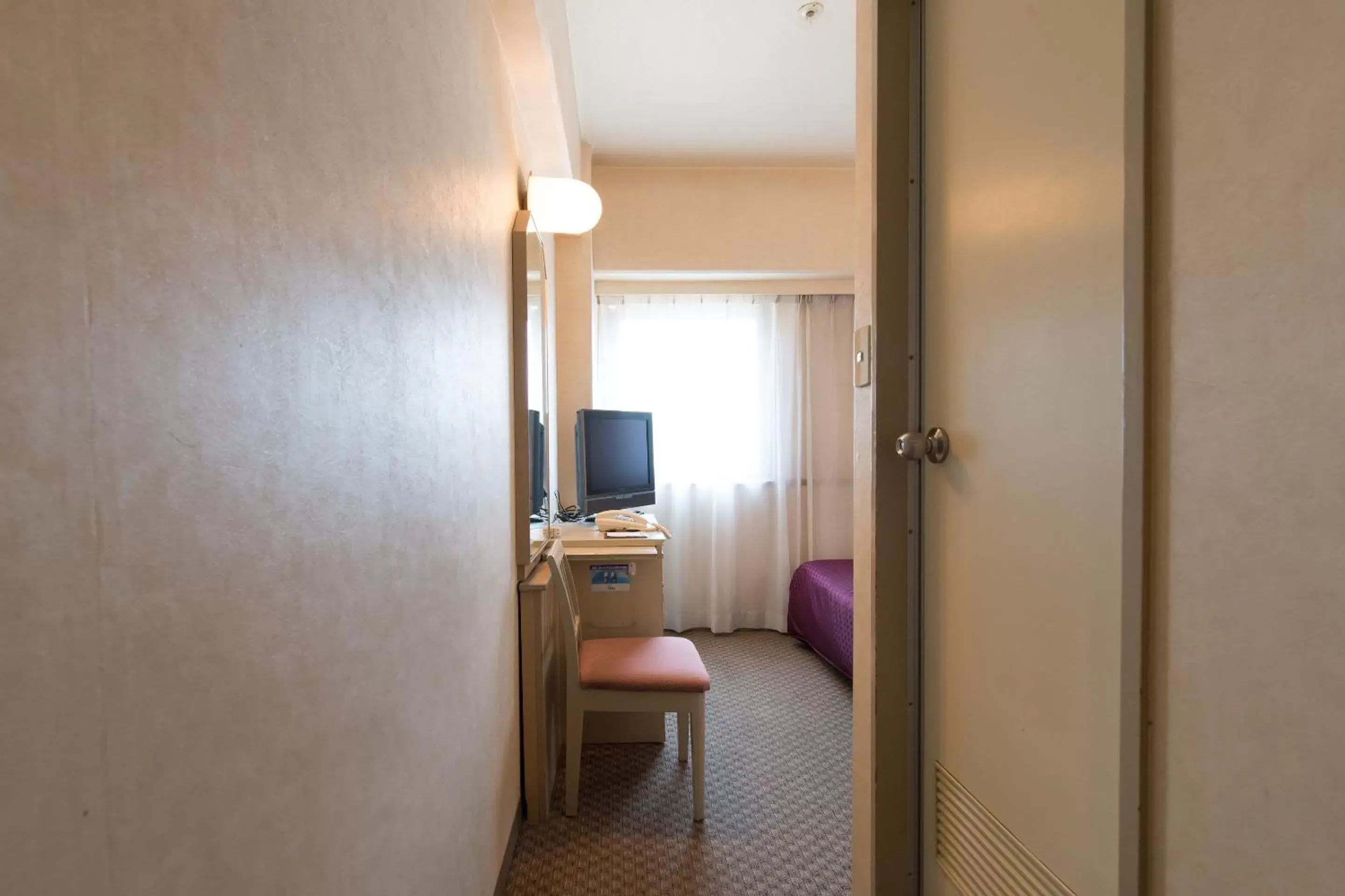 Photo of the whole room, TV/Entertainment Center in Tabist Hotel Tetora Kitakyushu