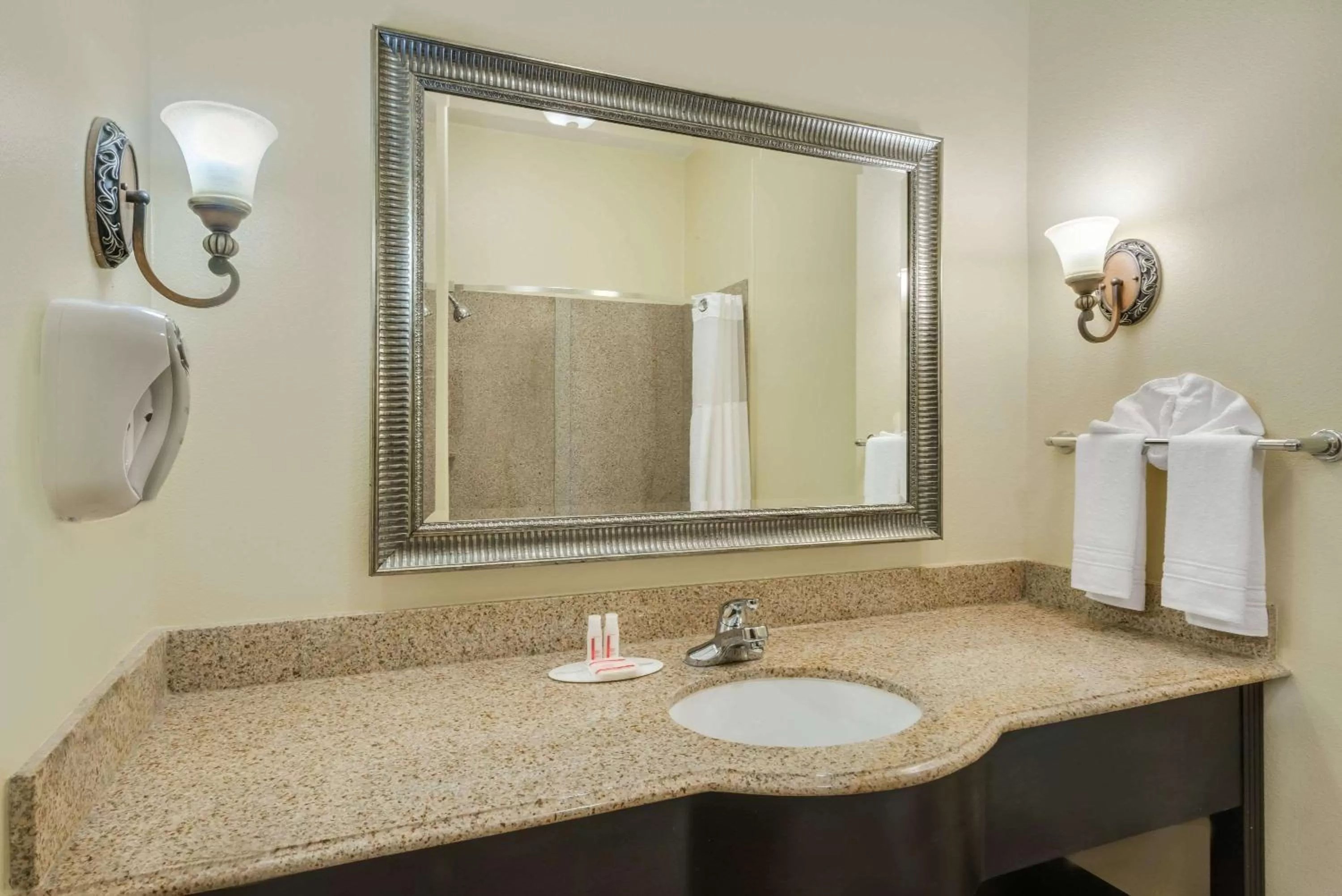 Bathroom in Super 8 by Wyndham Hidalgo at La Plaza Mall & Mcallen Airport