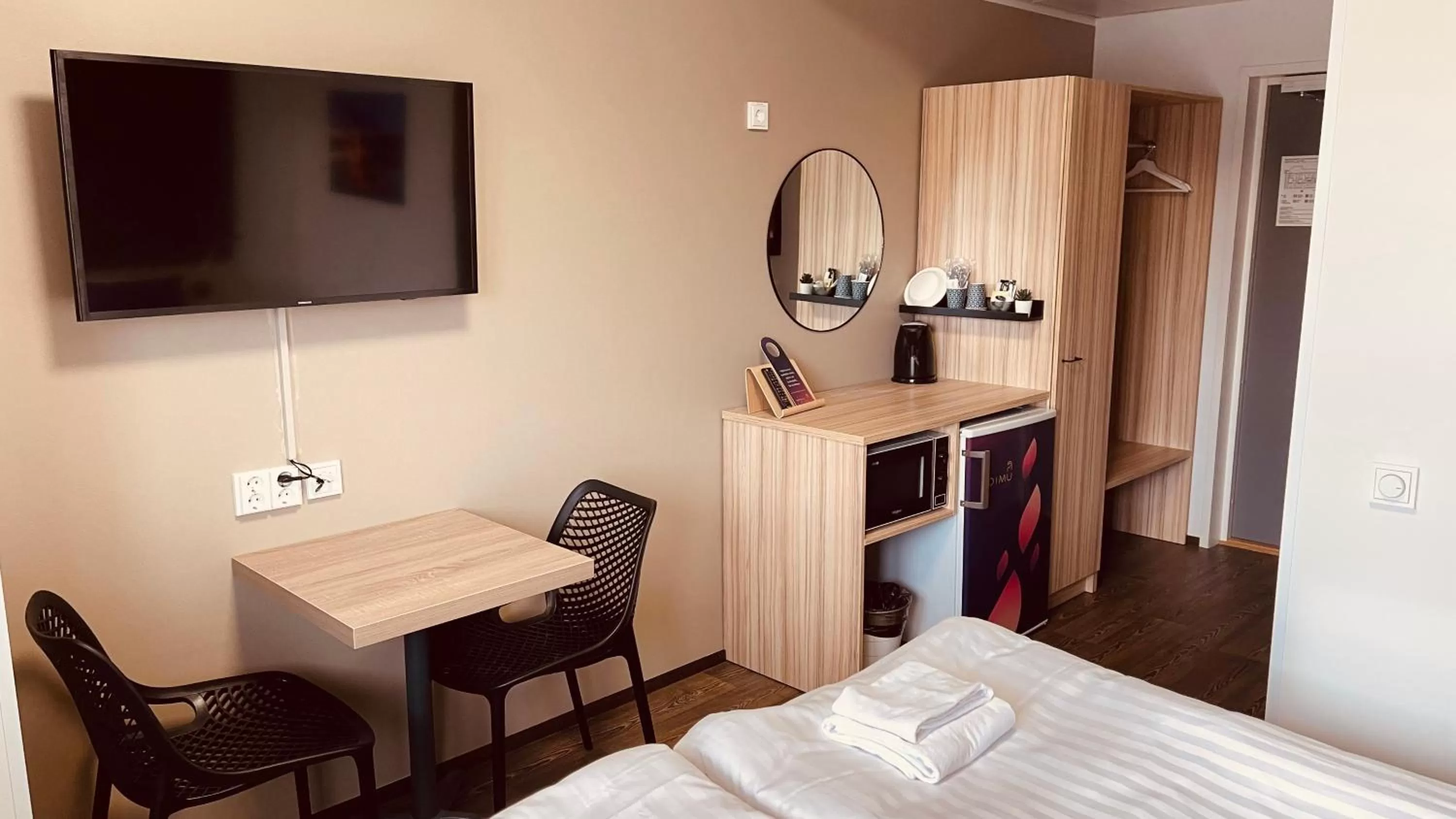 TV and multimedia, Bed in Hotelli Loimu by UHANDA