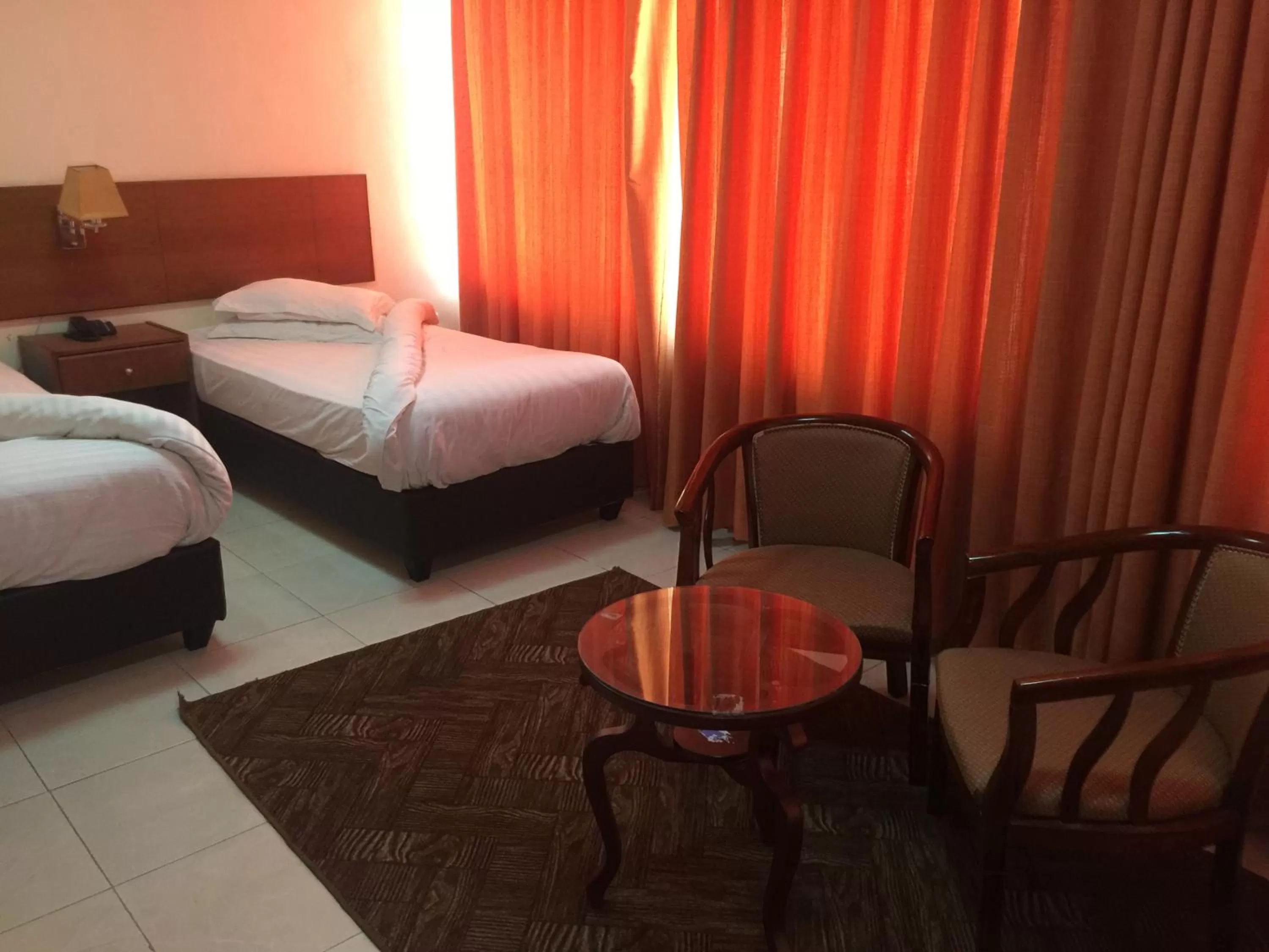 Bed in Zaina Plaza Hotel