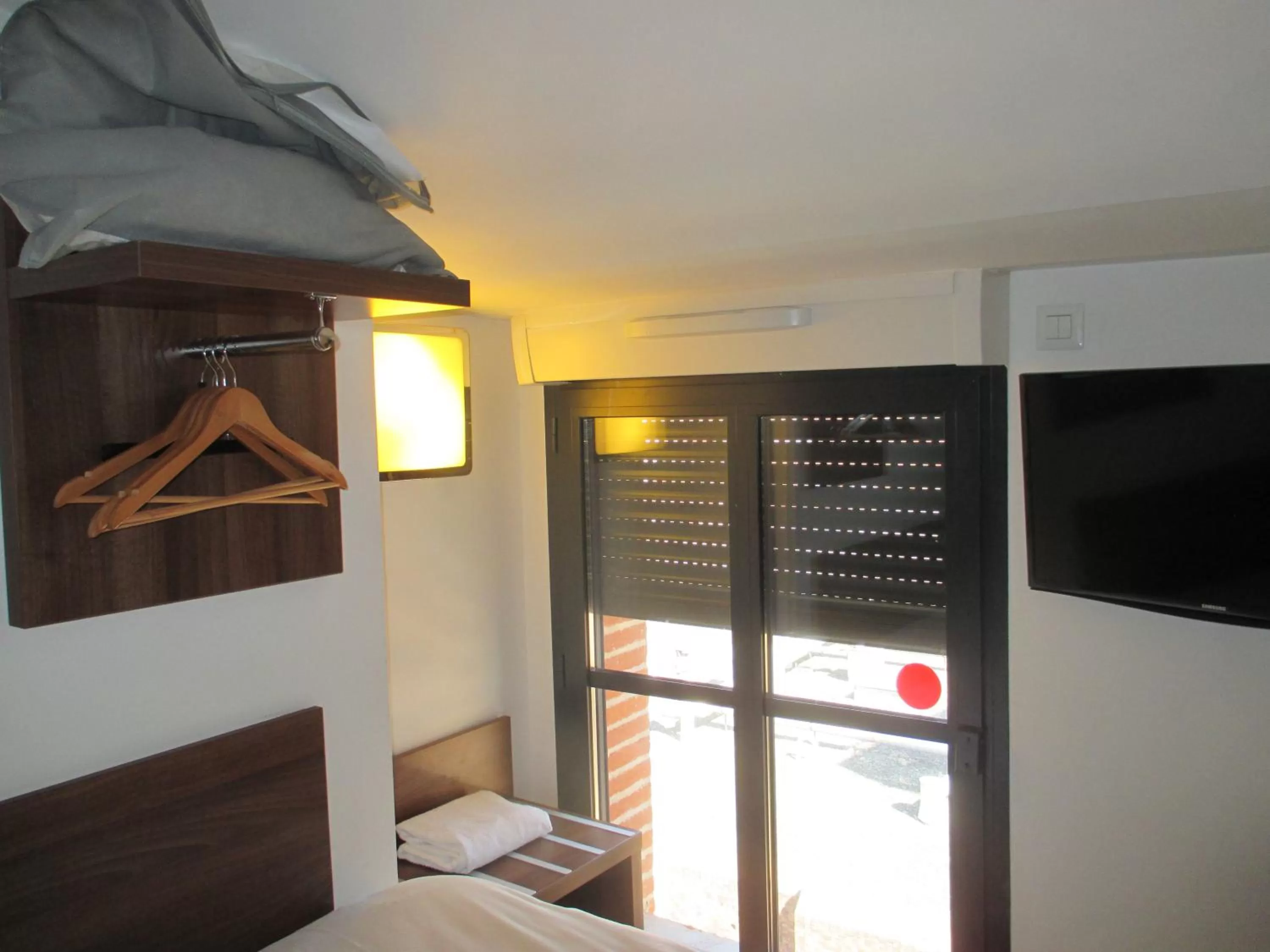 Bedroom, Bed in Hôtel le Pastel