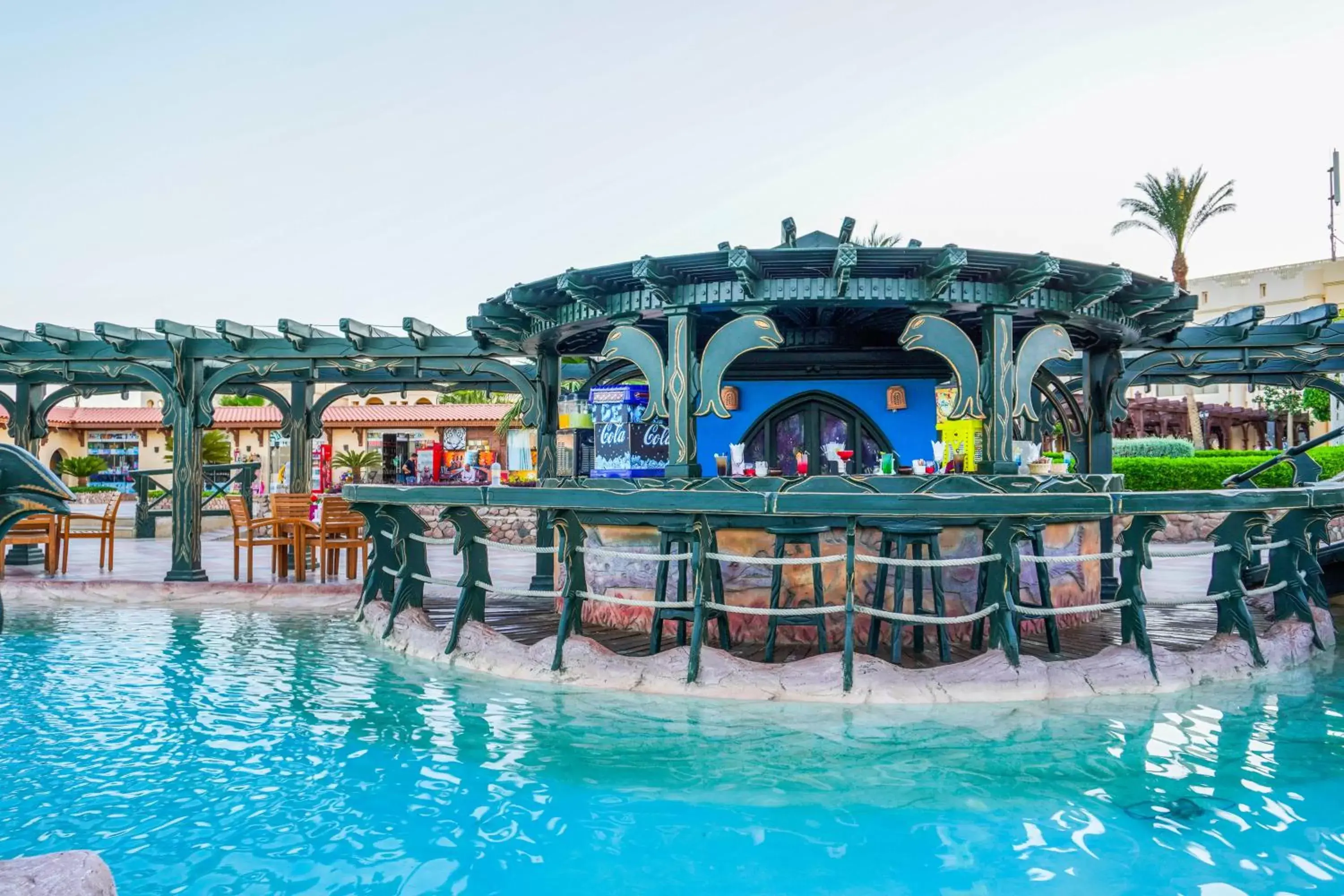Lounge or bar, Swimming Pool in Charmillion Club Resort