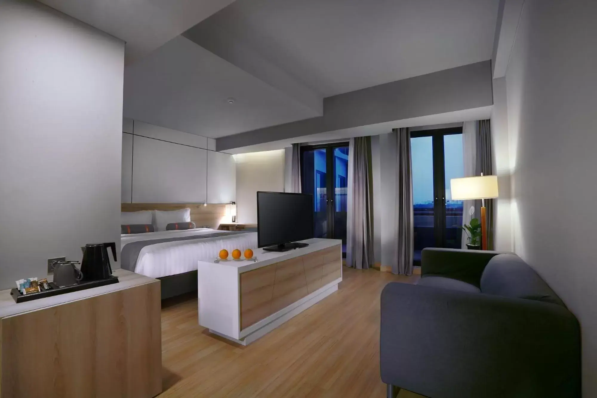 Bed, TV/Entertainment Center in Harper Cikarang by ASTON