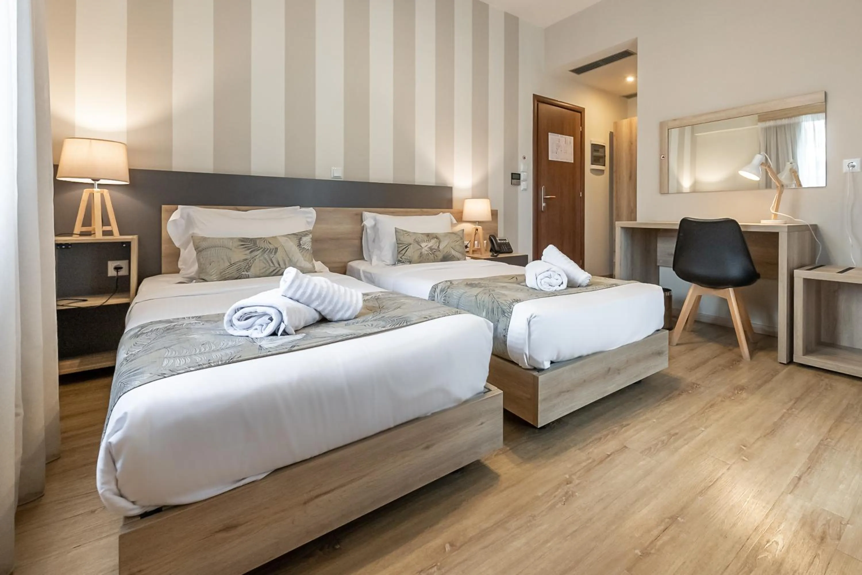 Bed in Hotel @Syngrou Fix