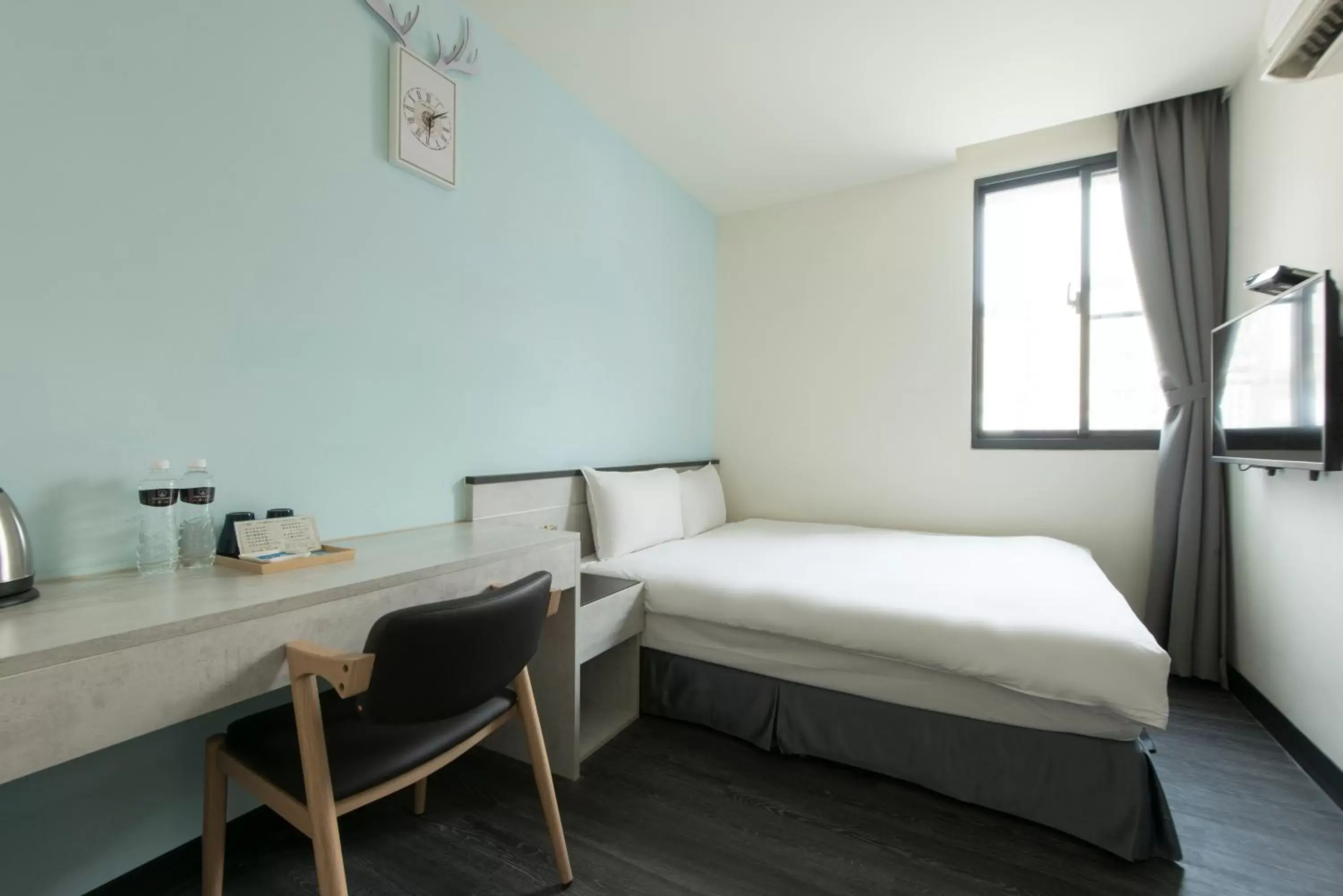 Bed in Raise Hotel Taichung