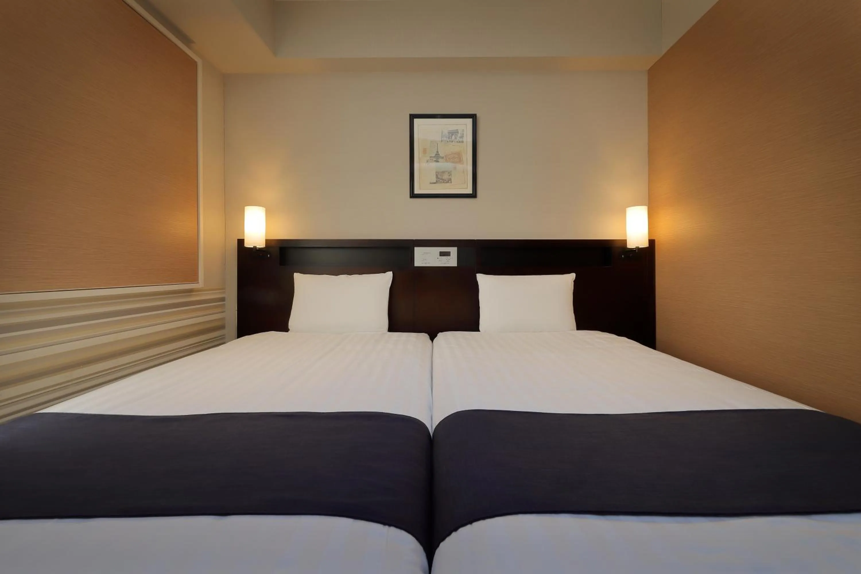 Bed in Keio Presso Inn Shinjuku