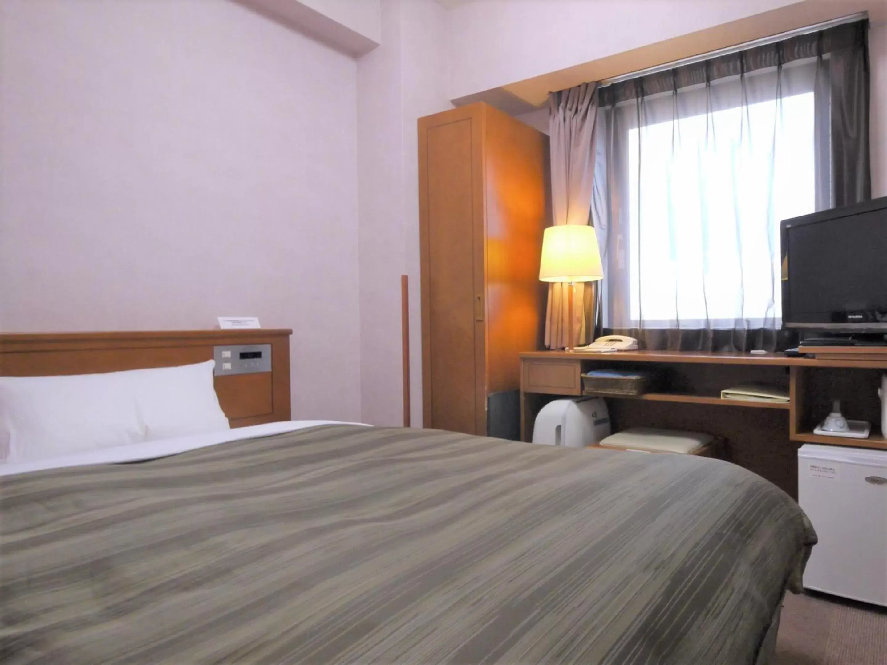 Photo of the whole room, Bed in Hotel Route-Inn Asahikawa Ekimae Ichijodori