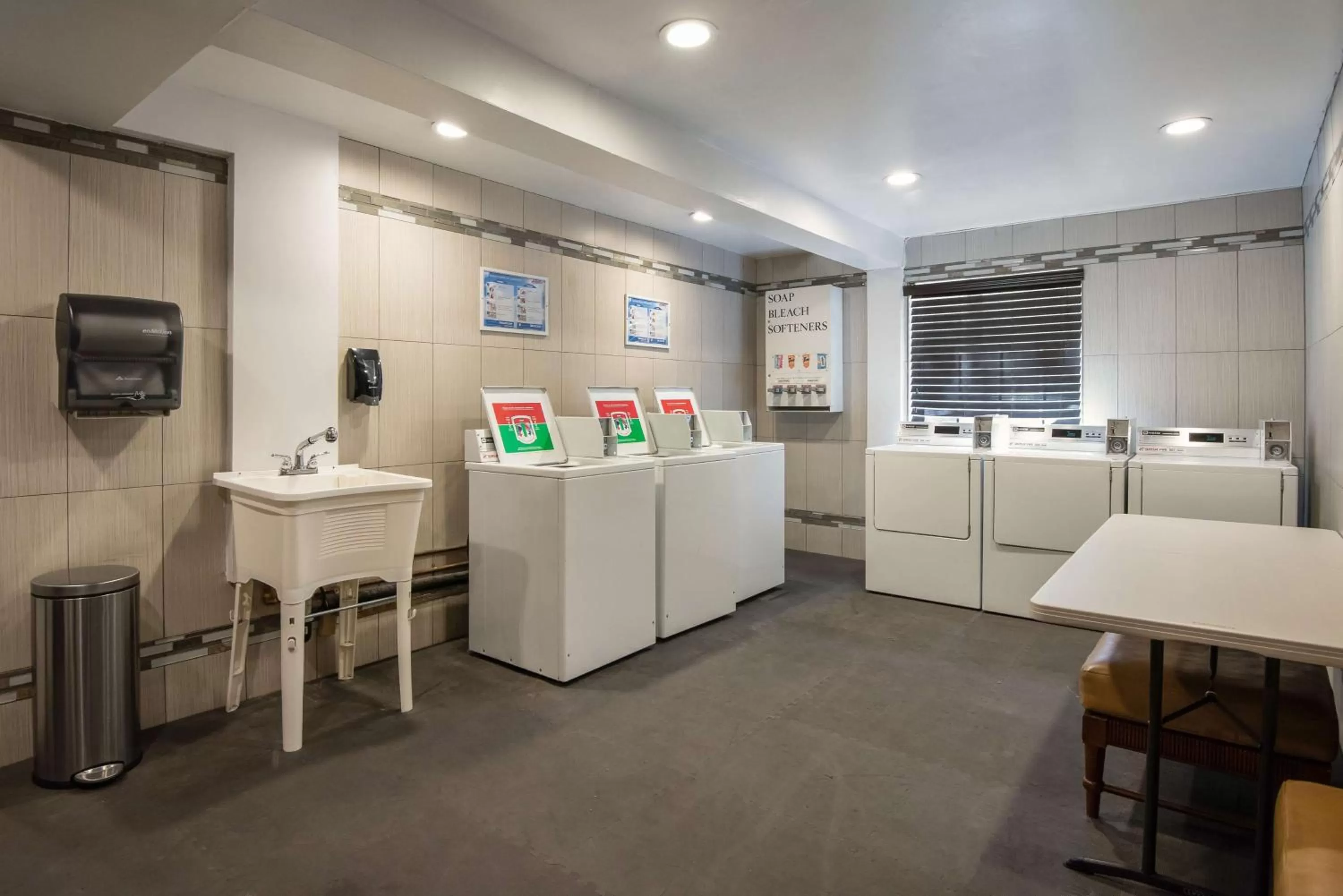 laundry in SureStay Plus Hotel by Best Western Reno Airport