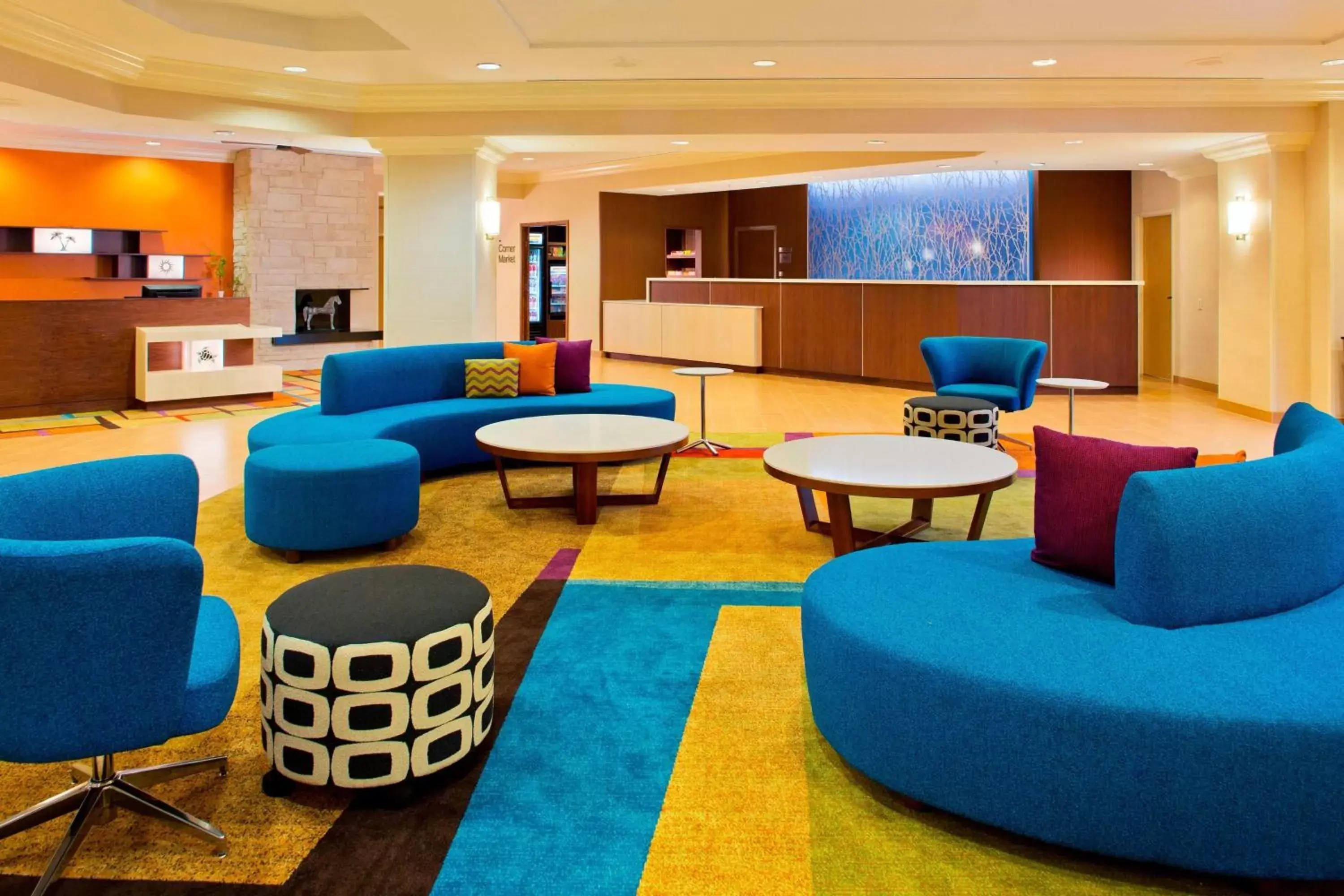 Lobby or reception, Lounge/Bar in Fairfield Inn & Suites by Marriott Orlando Lake Buena Vista in the Marriott Village