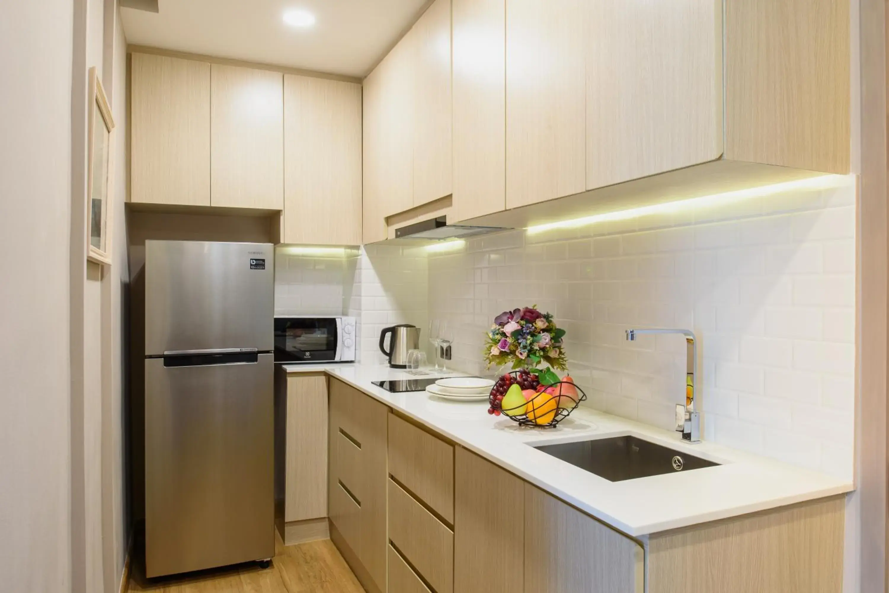 Kitchen/Kitchenette in Parc Borough City Resort -SHA Extra Plus