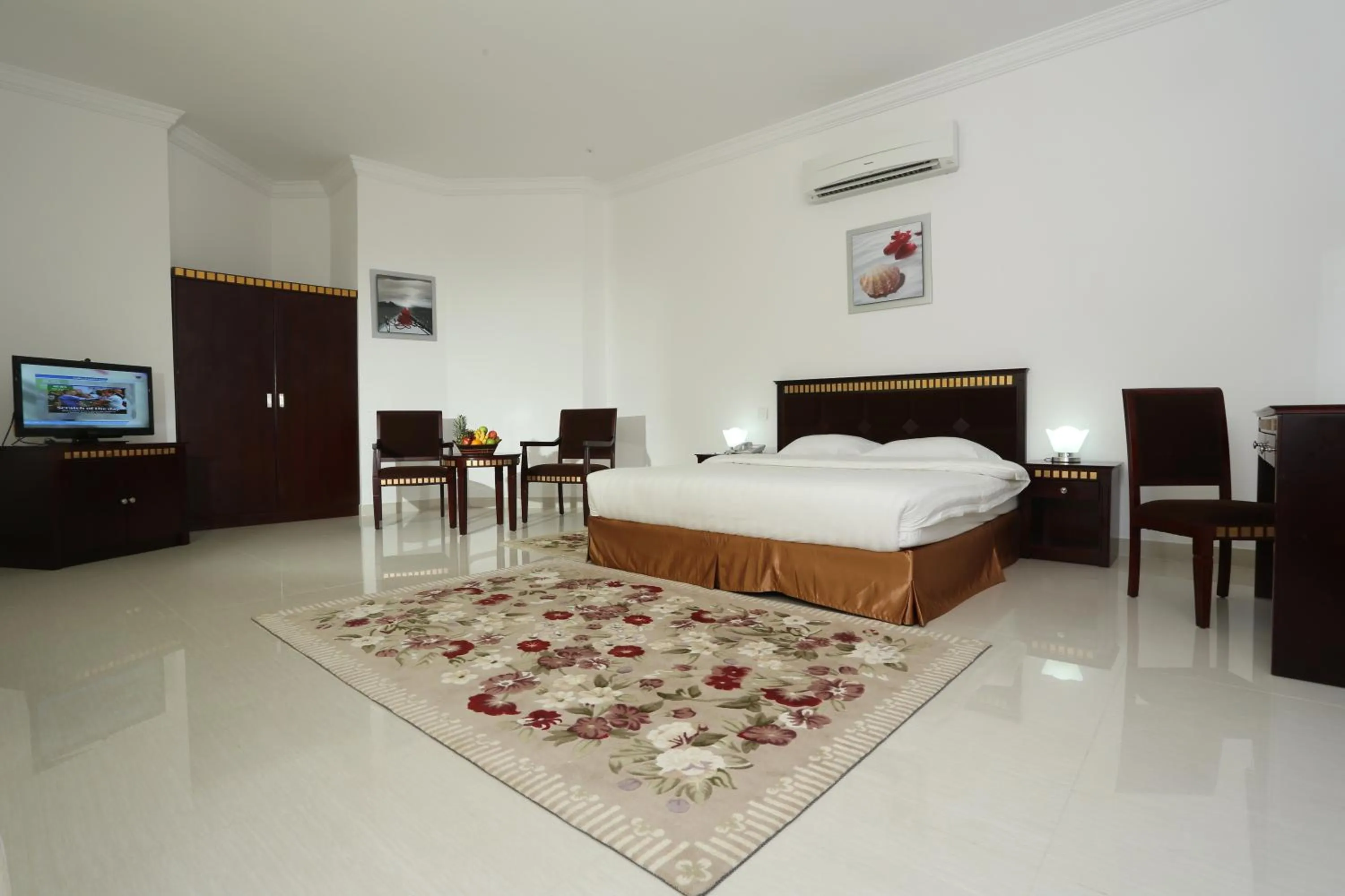 Photo of the whole room, Bed in Beach Resort Salalah