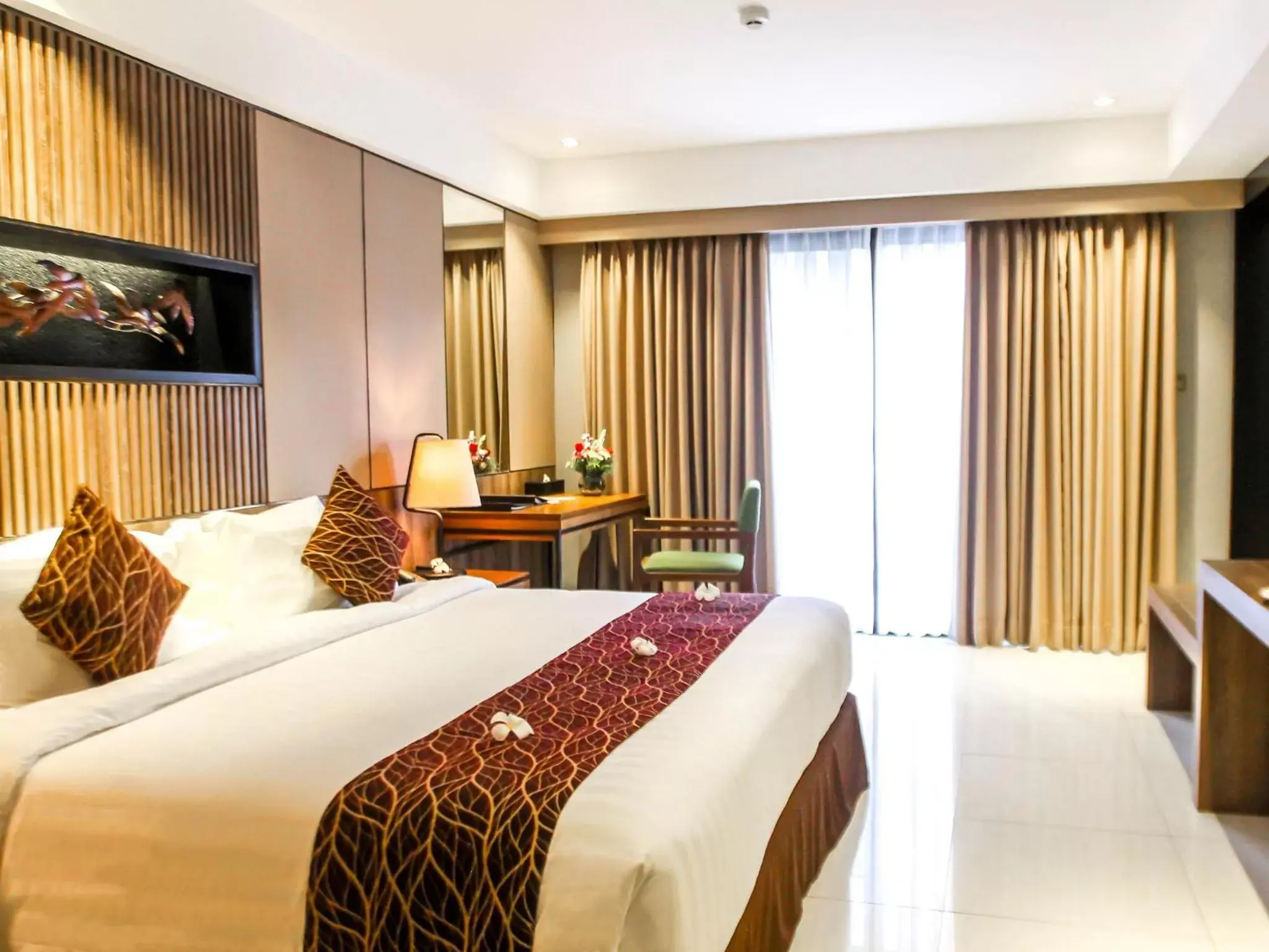 Bed in The Nest Hotel Nusa Dua