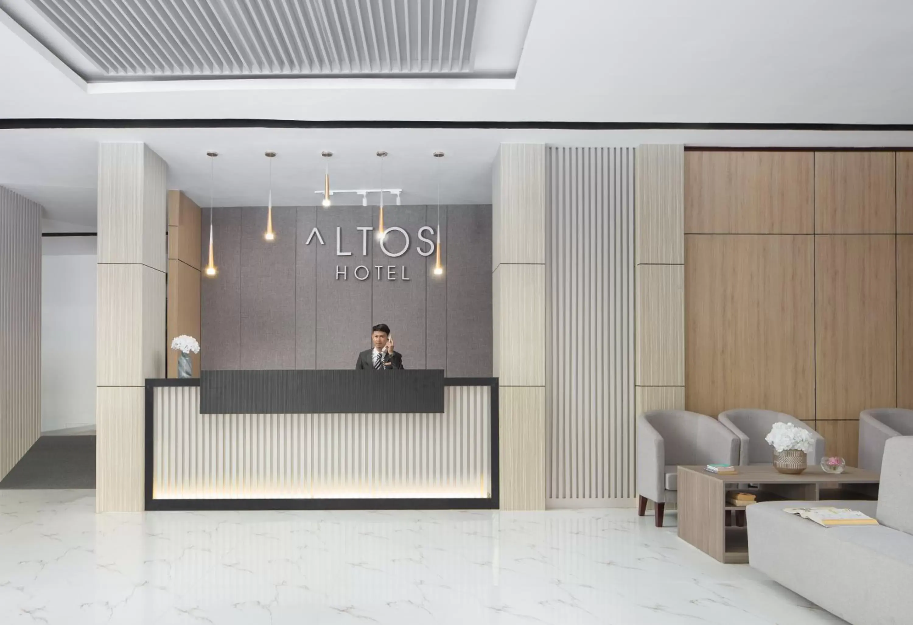 Lobby or reception in Altos Hotel