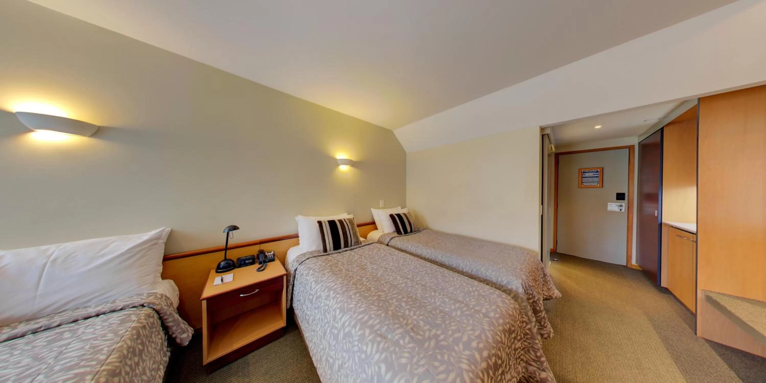 Bedroom, Bed in Dunedin Leisure Lodge - Distinction