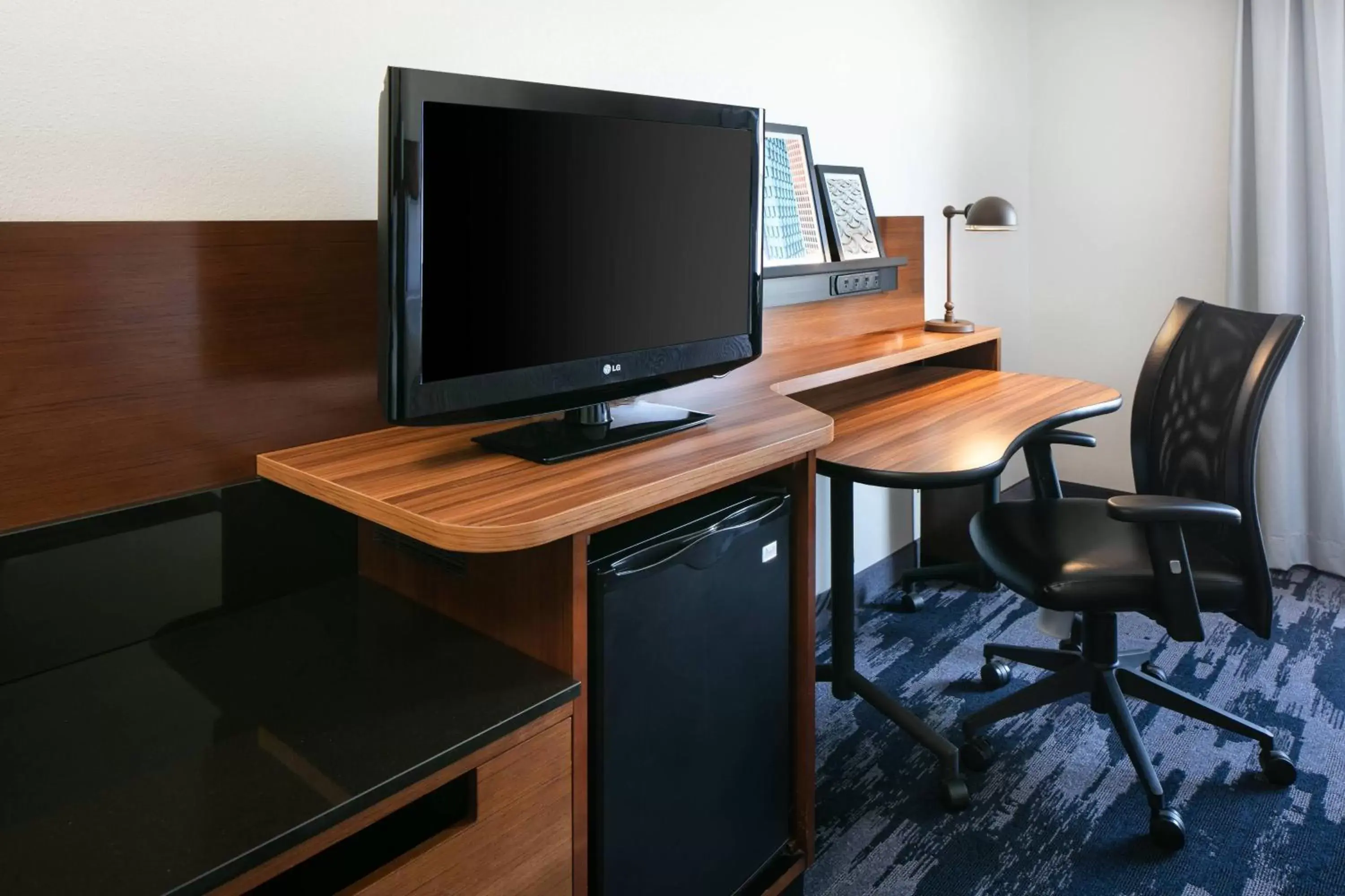 Photo of the whole room, TV/Entertainment Center in Fairfield Inn & Suites by Marriott Tulsa Central