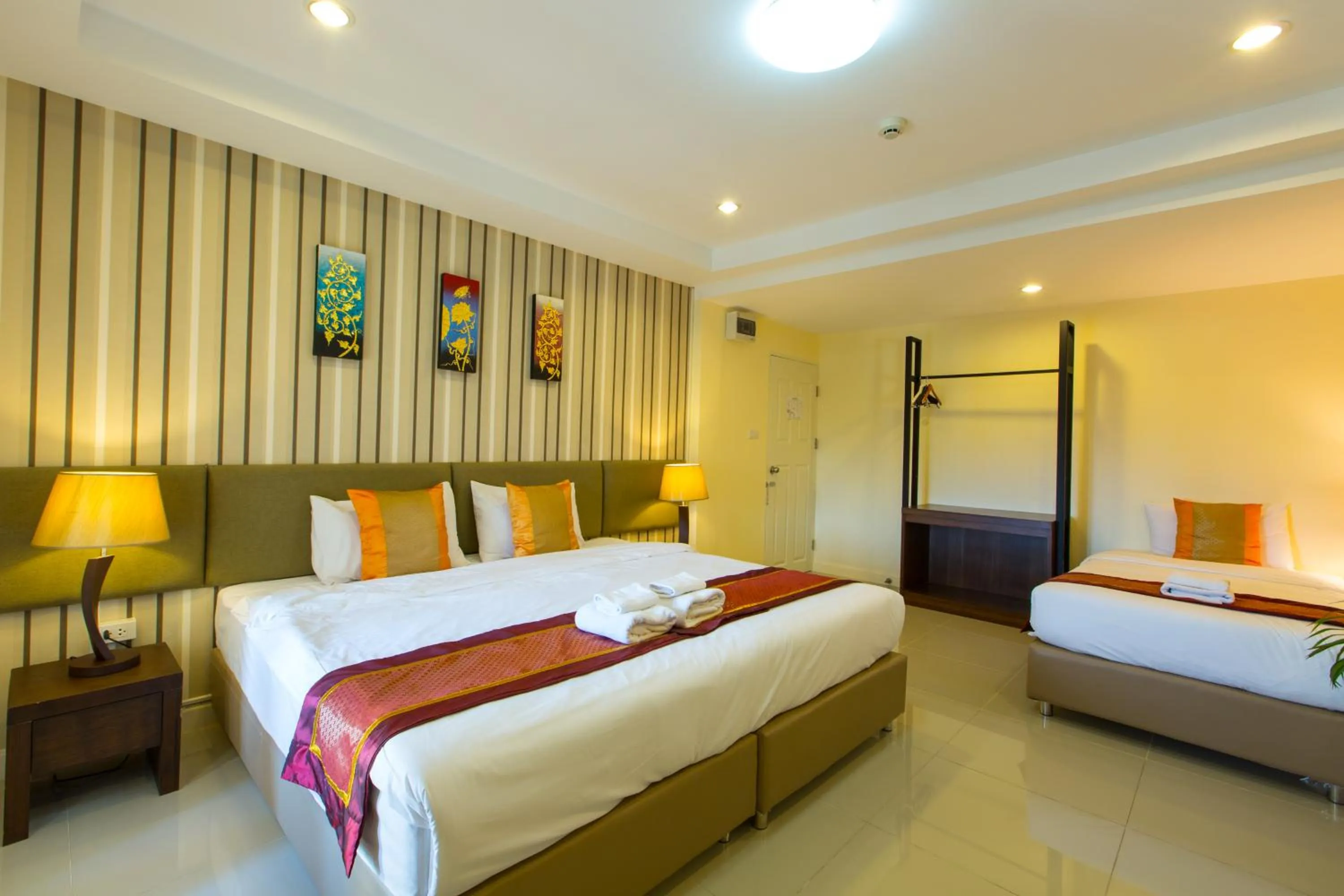 Photo of the whole room, Bed in Chiang Mai Waroros Boutique Hotel