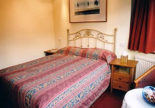 Bedroom in Nonsuch Park Hotel